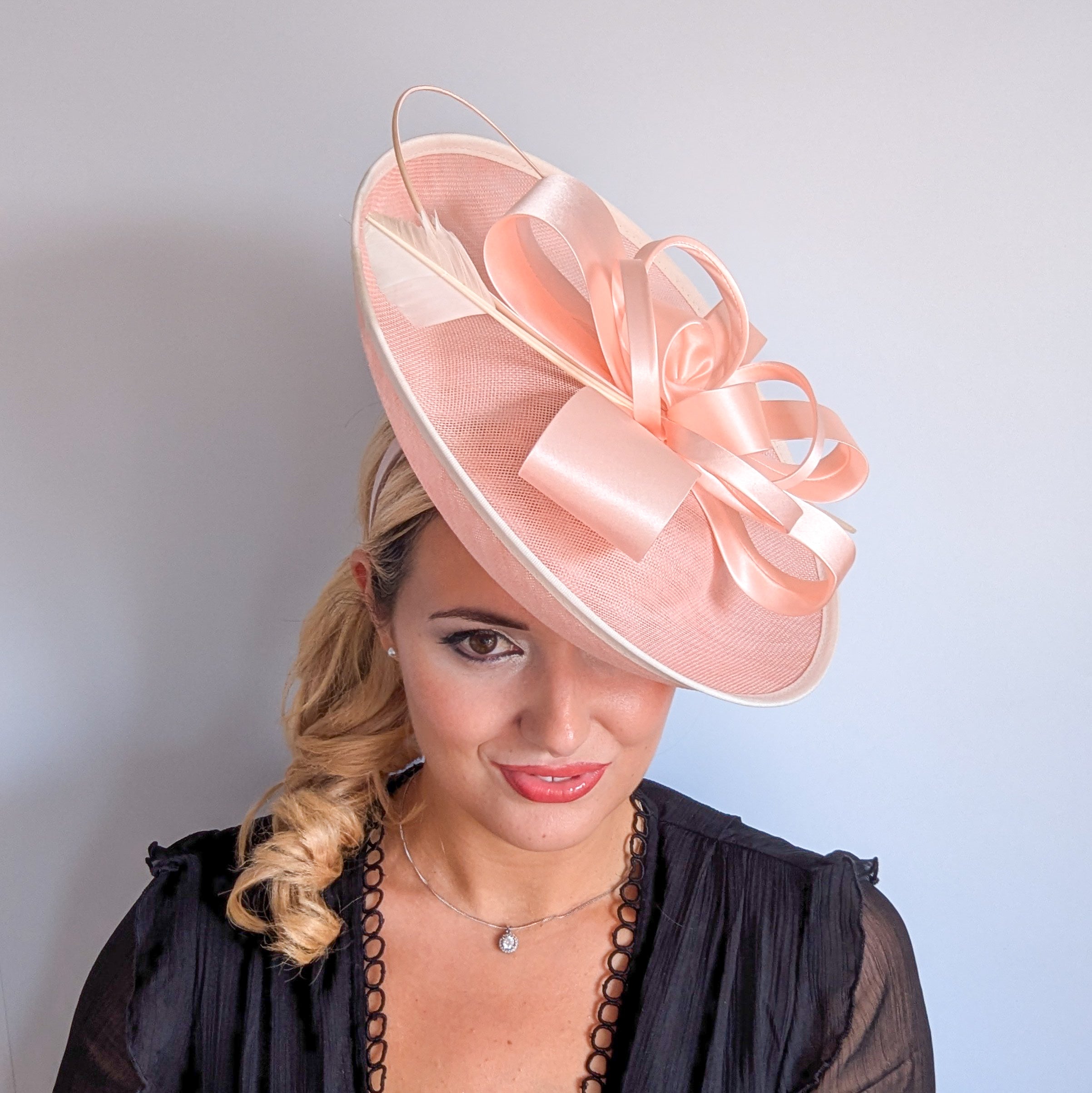 Light pink feather large saucer disc fascinator hat