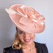 Light pink feather large saucer disc fascinator hat