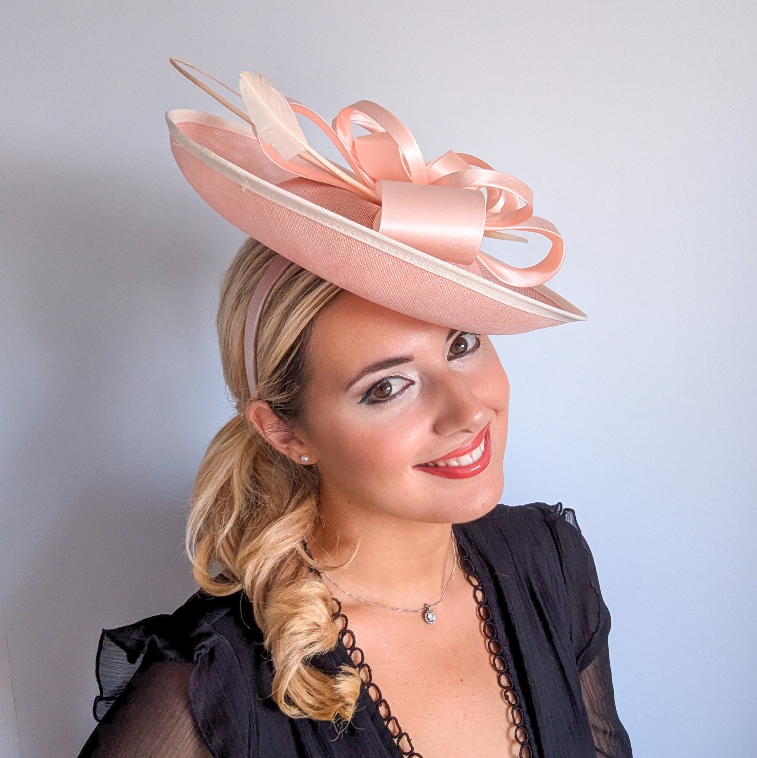Light pink feather large saucer disc fascinator hat