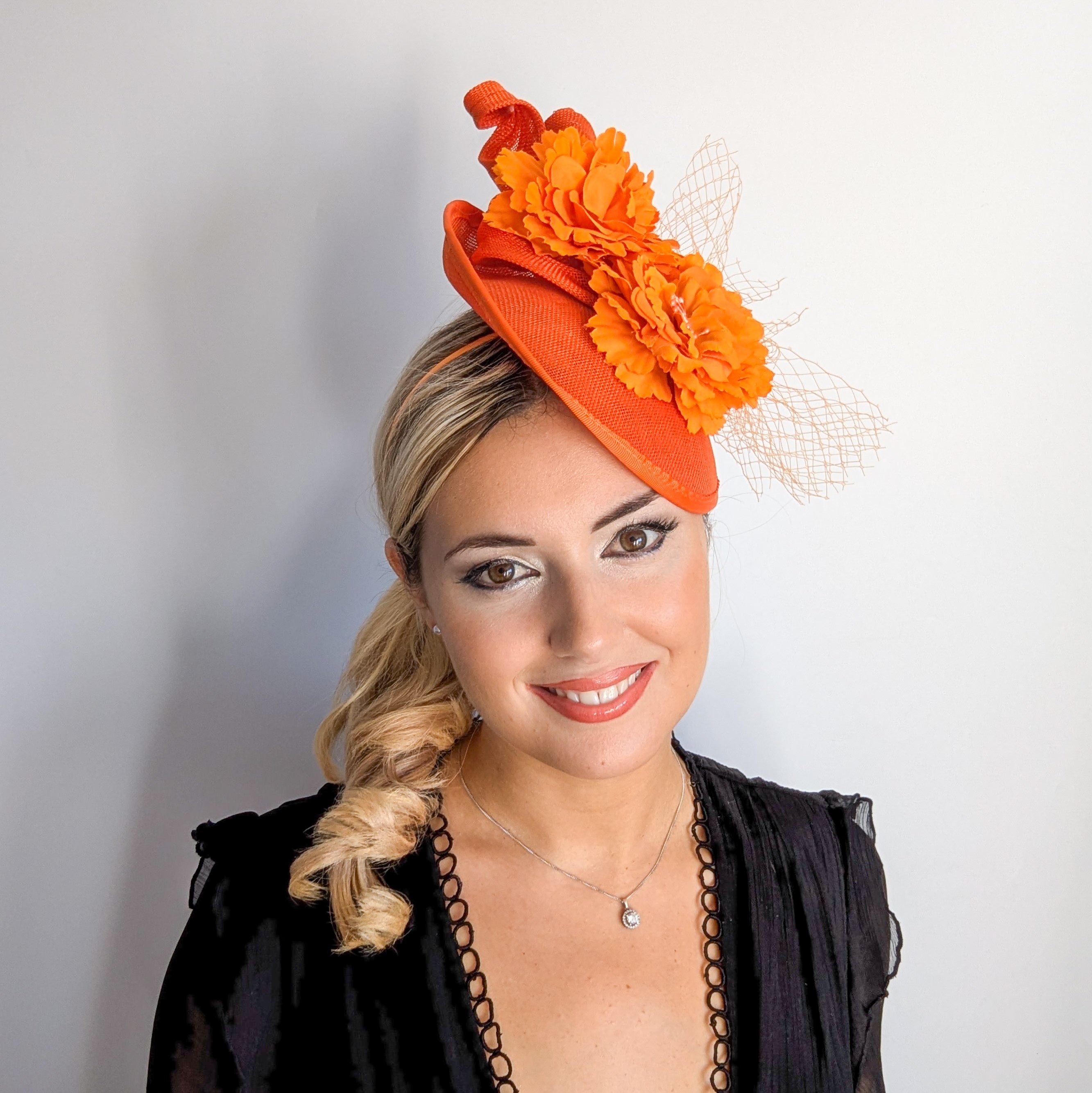 Orange flower fascinator disc saucer hat
