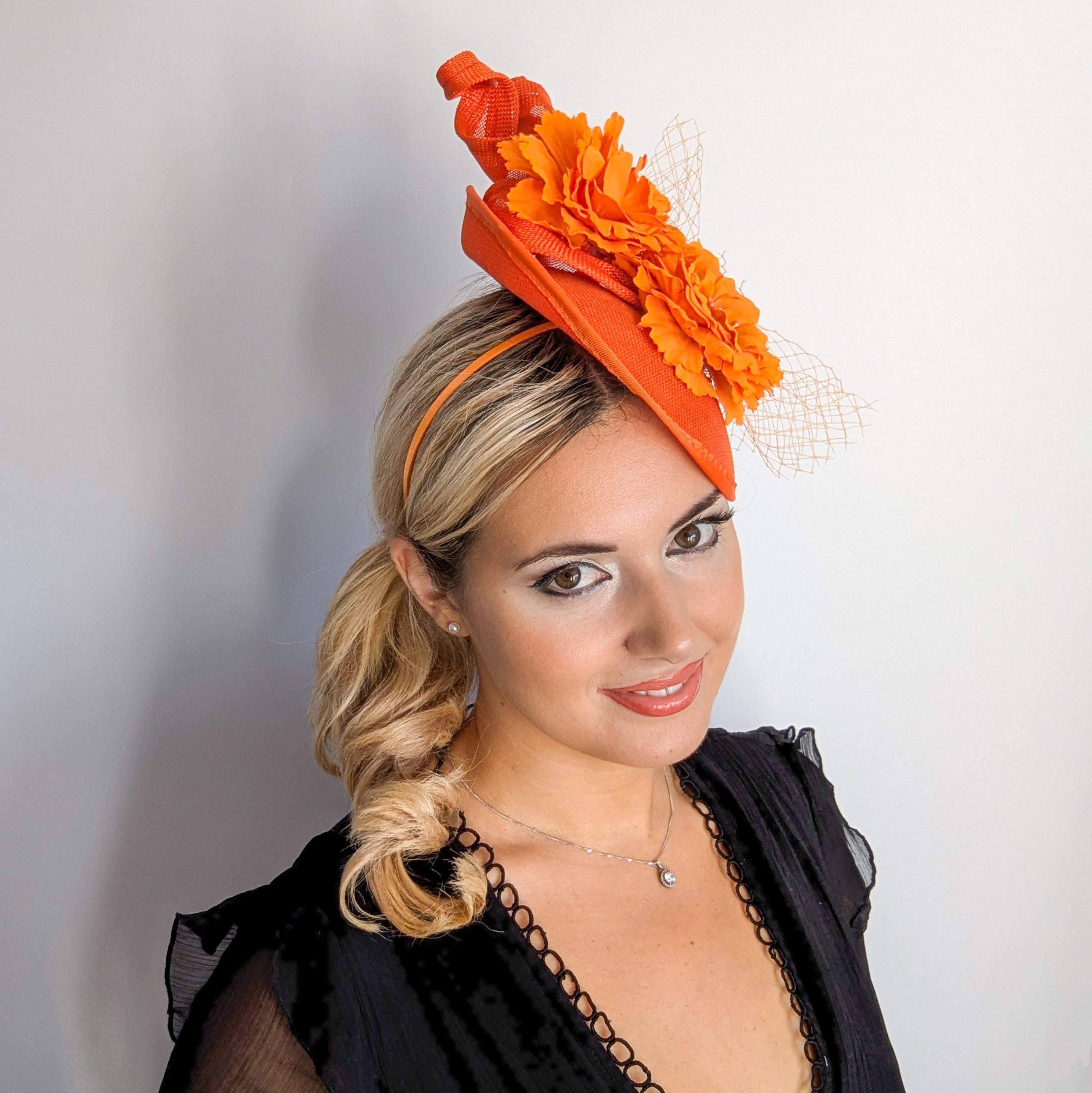 Orange flower fascinator disc saucer hat
