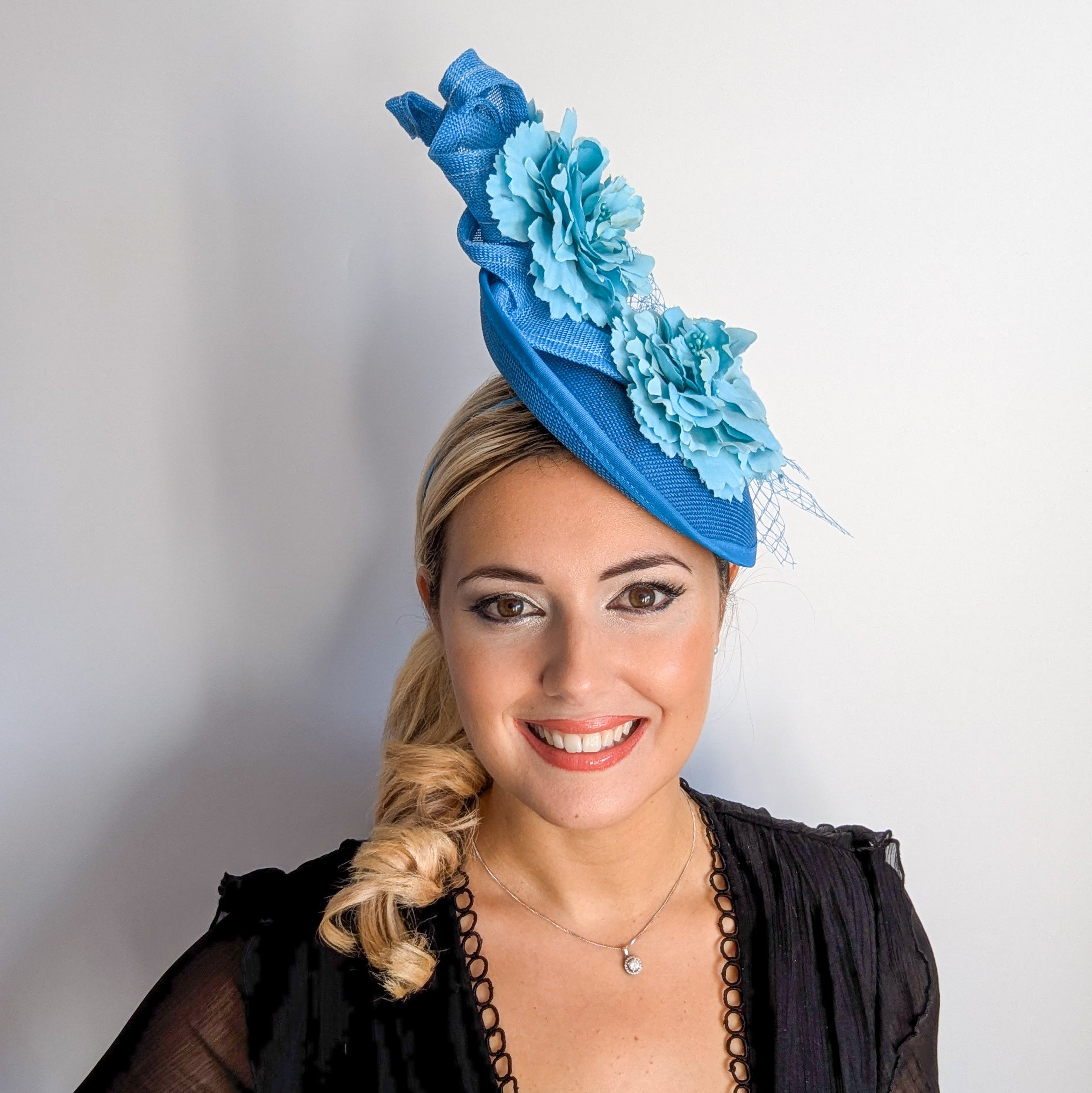 Sea blue flower fascinator disc saucer hat