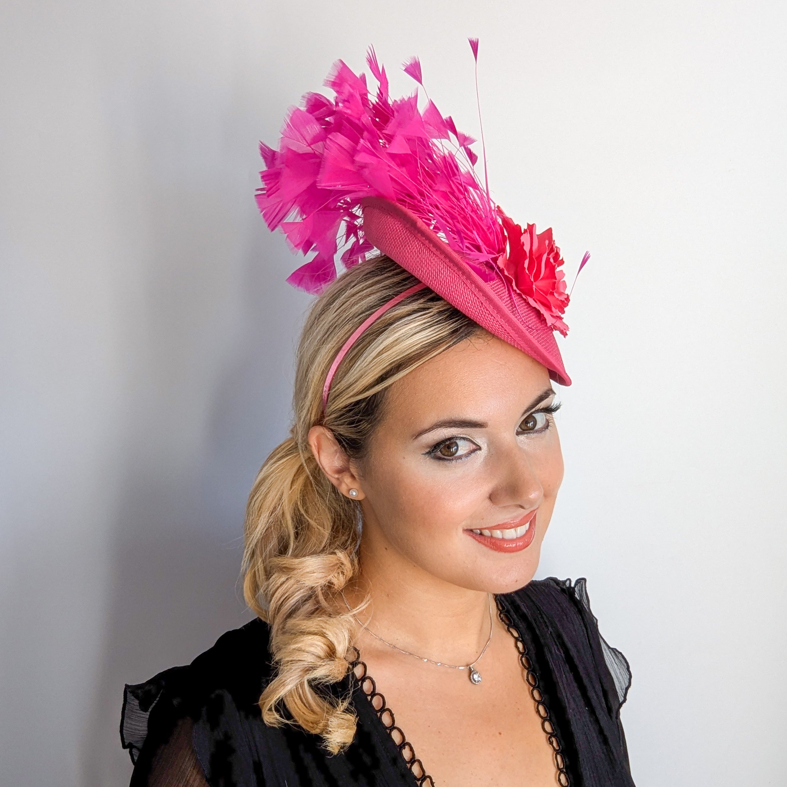 Fuchsia pink flower feather disc saucer fascinator hat