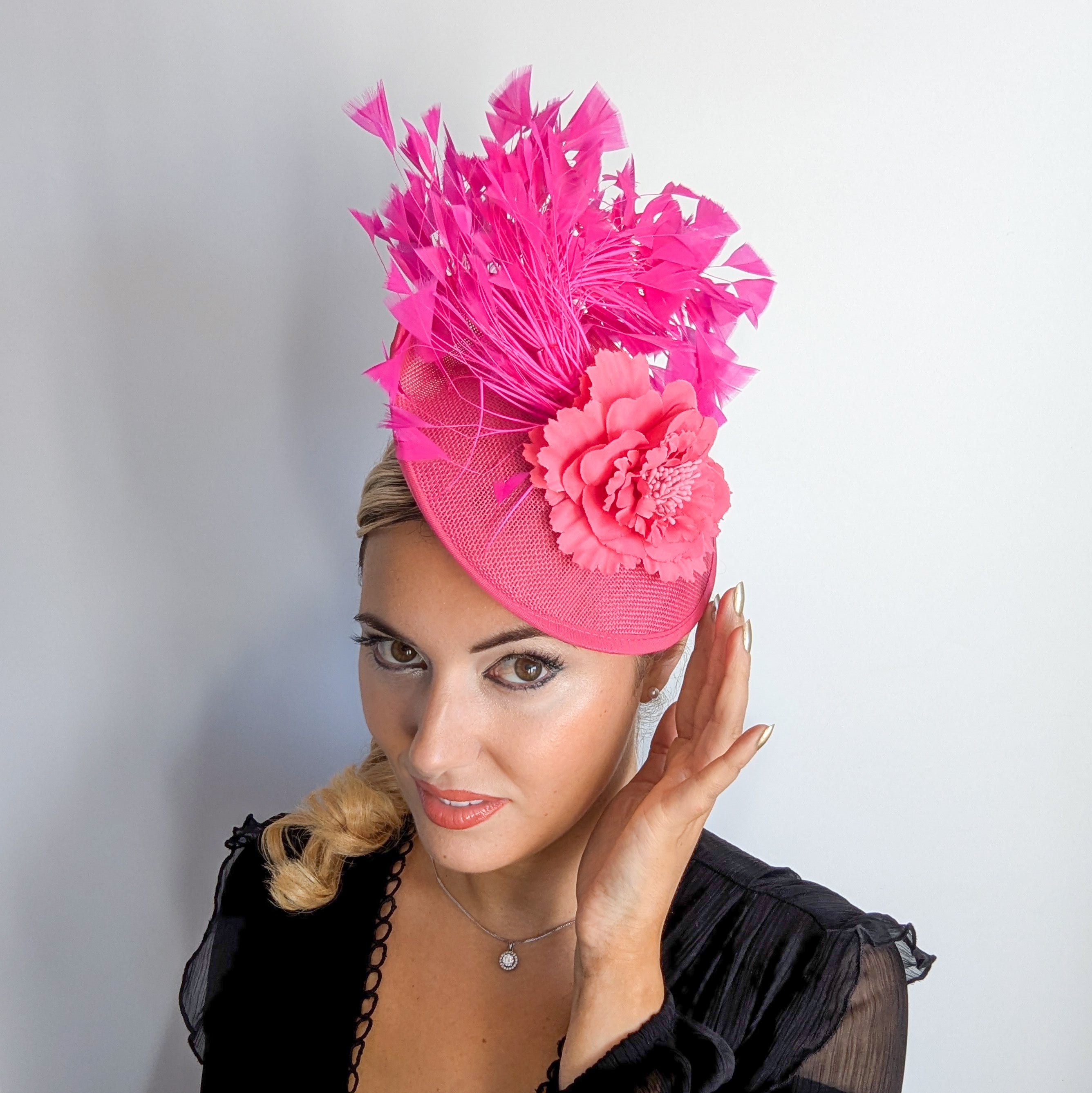 Fuchsia pink flower feather disc saucer fascinator hat
