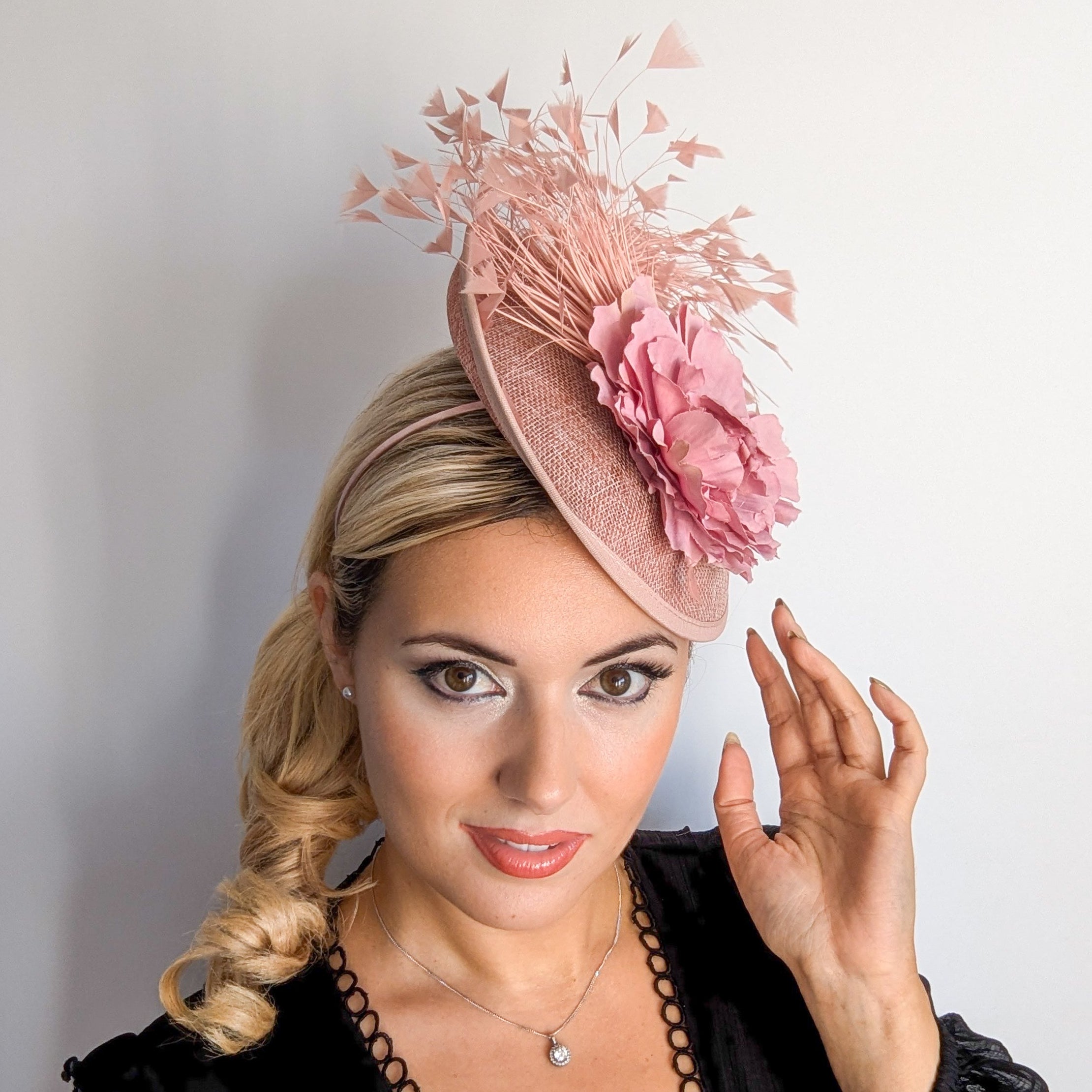 Blush pink flower feather disc saucer fascinator hat