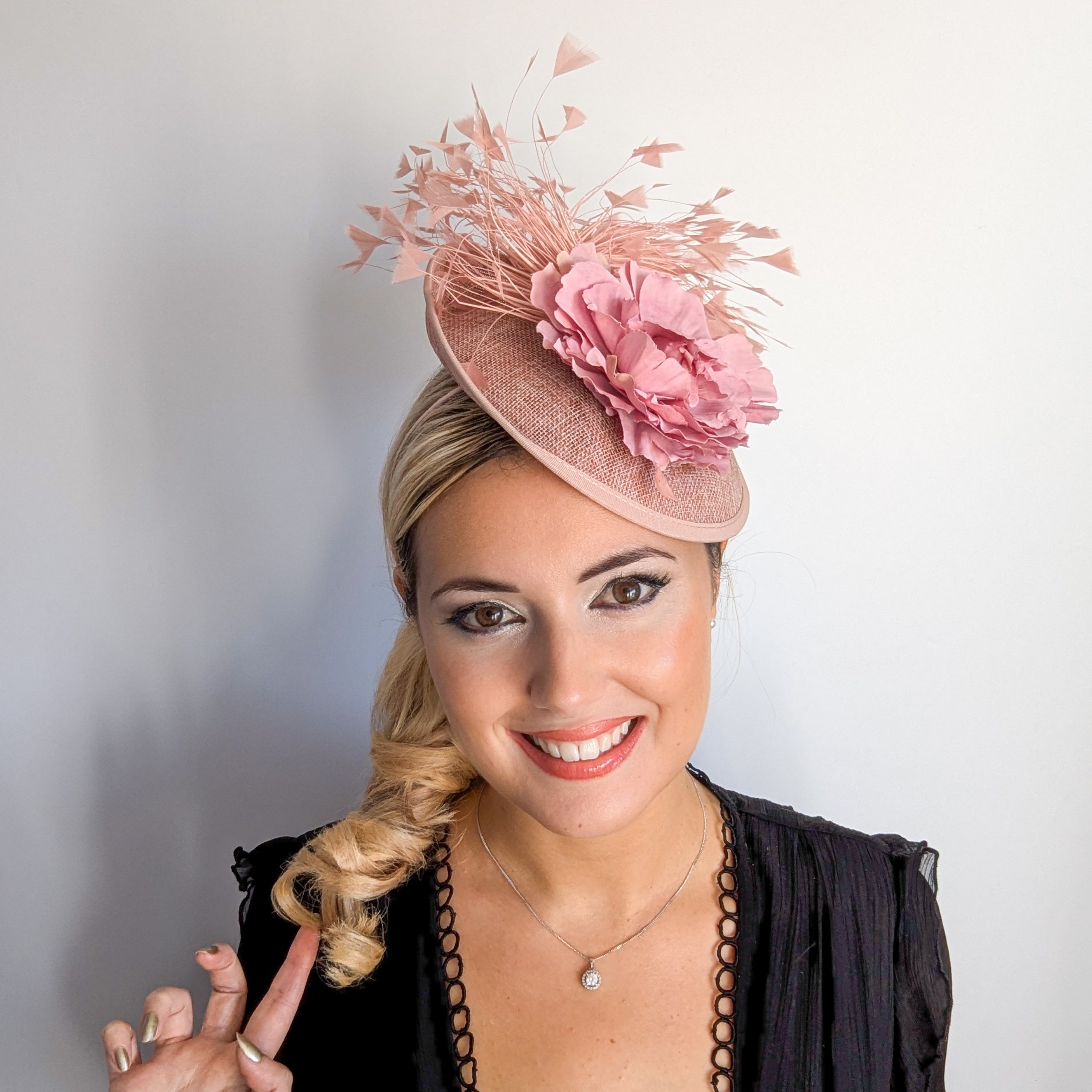 Blush pink flower feather disc saucer fascinator hat