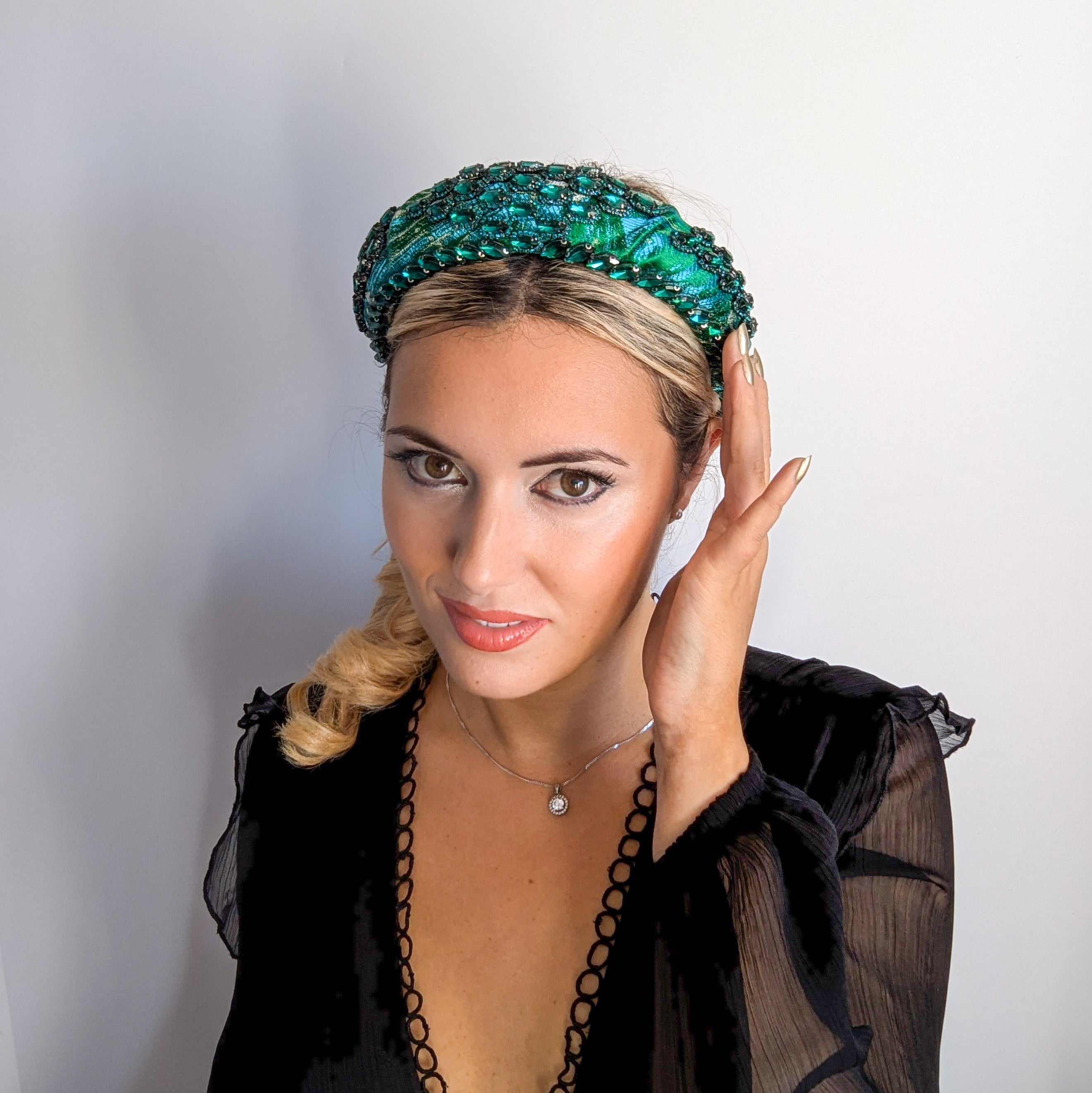 Emerald green crystal padded satin headband fascinator