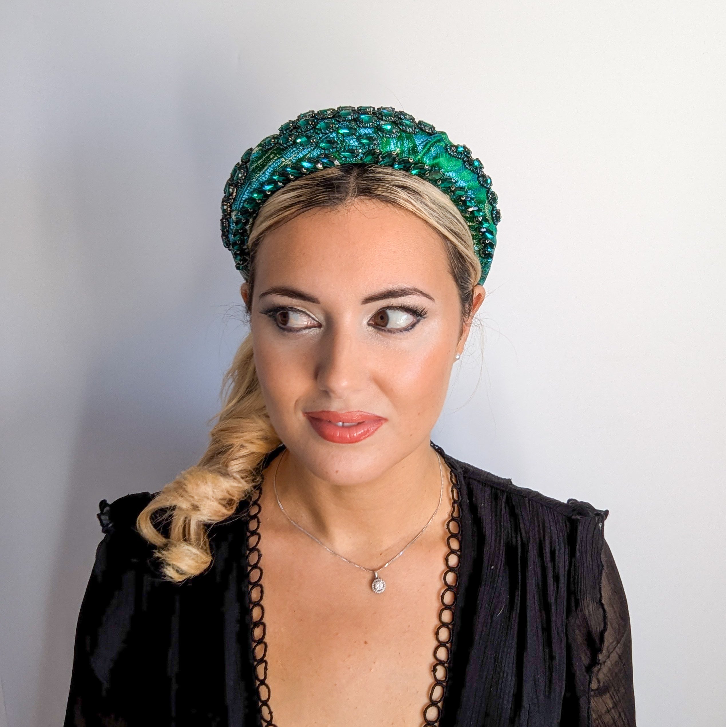 Emerald green crystal padded satin headband fascinator