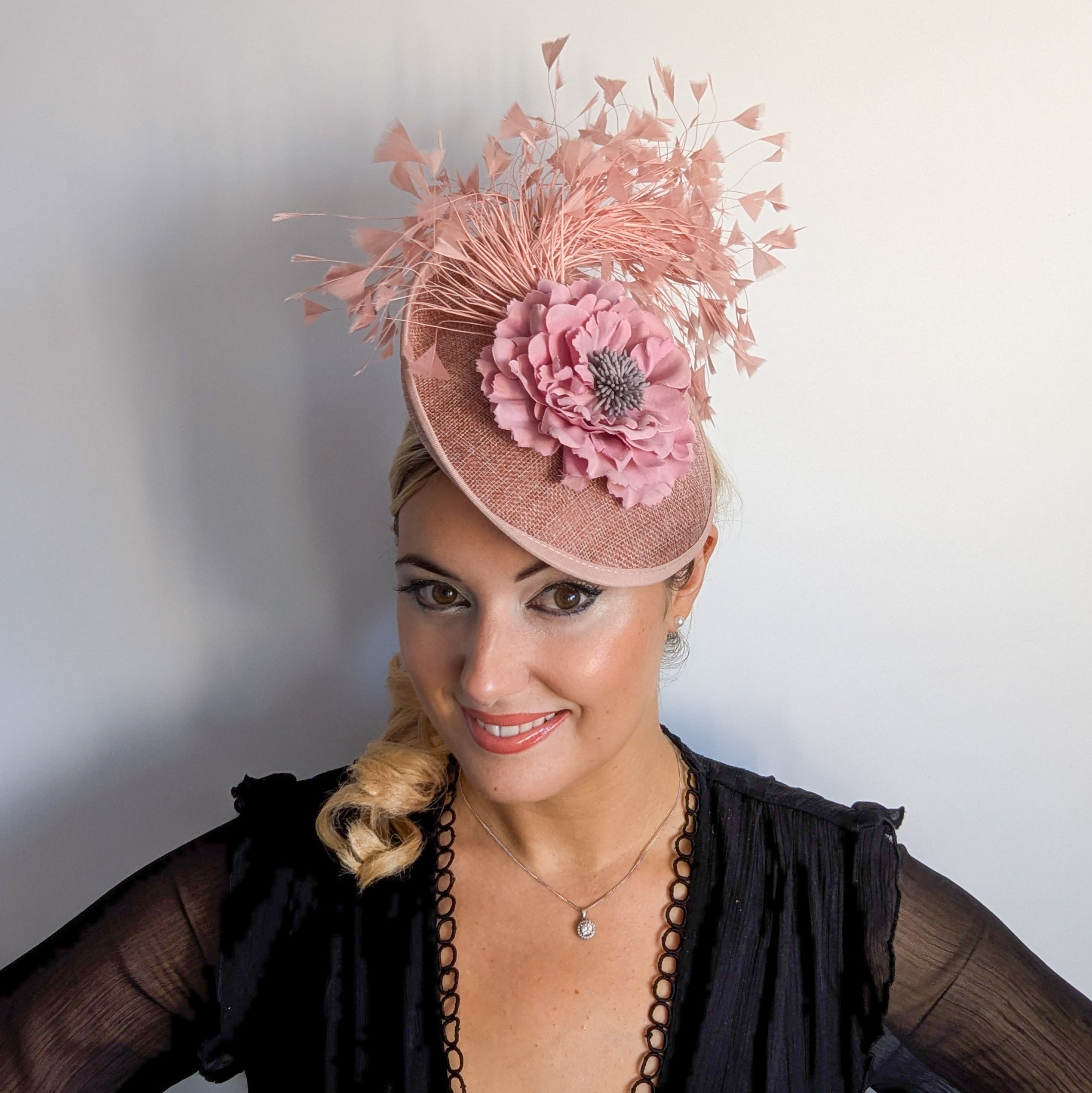 Blush pink flower feather disc saucer fascinator hat