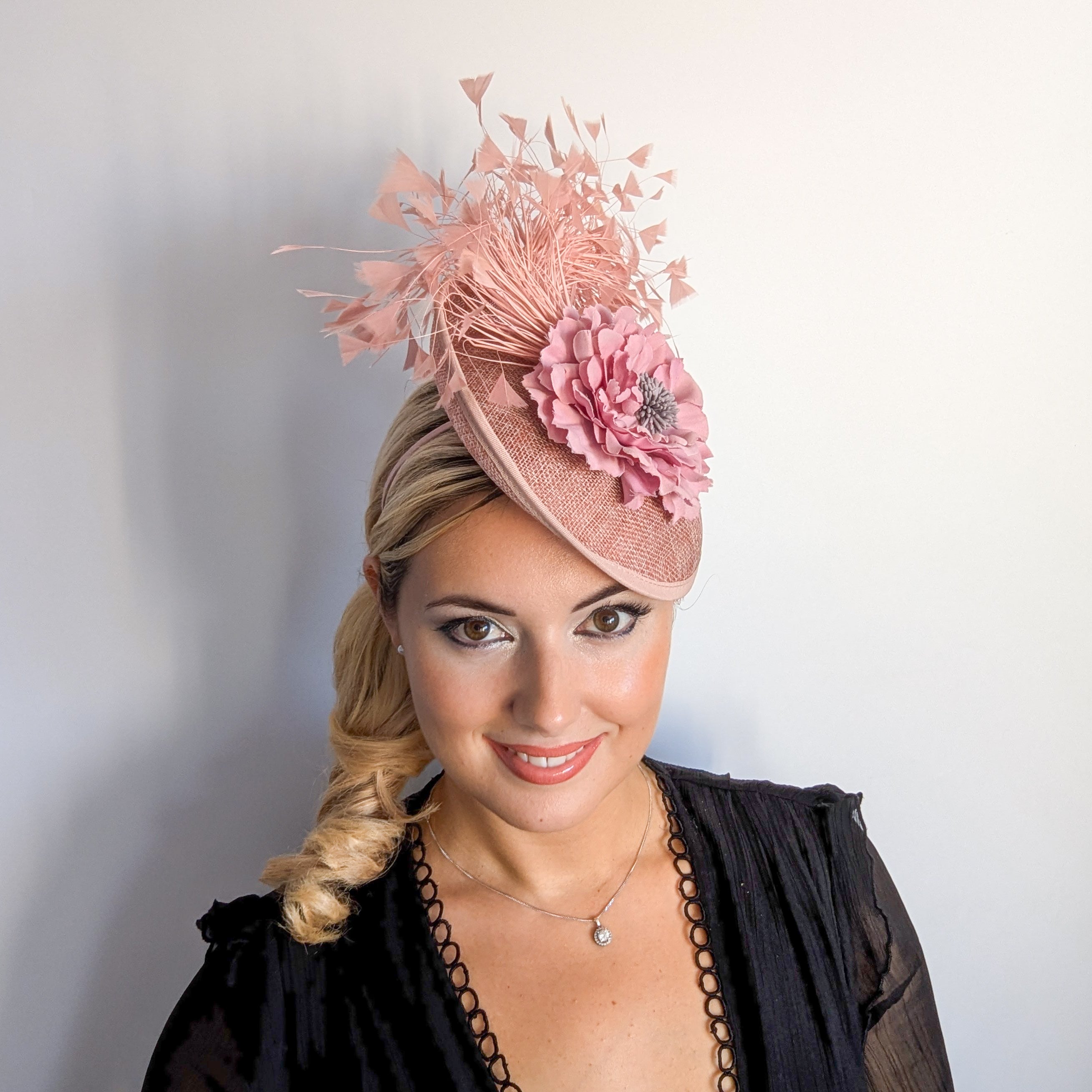 Blush pink flower feather disc saucer fascinator hat