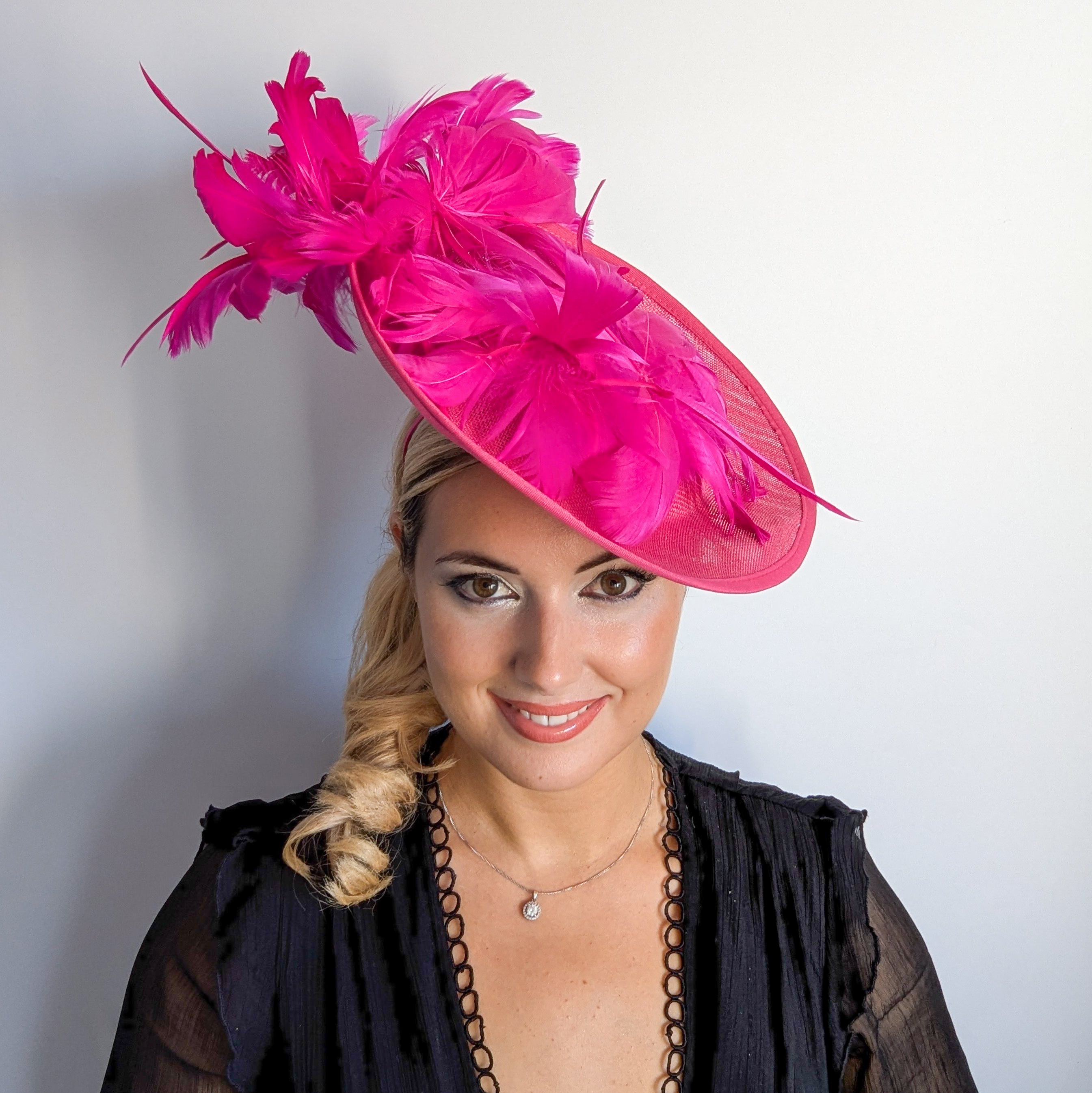 Fuchsia pink large feather saucer disc fascinator hat