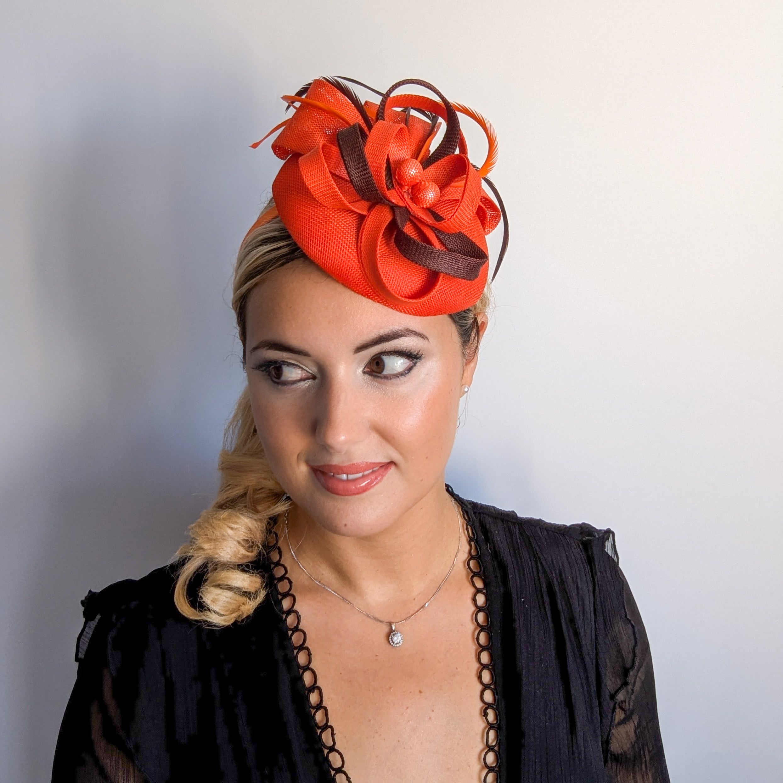 Orange brown feather fascinator disc saucer hat