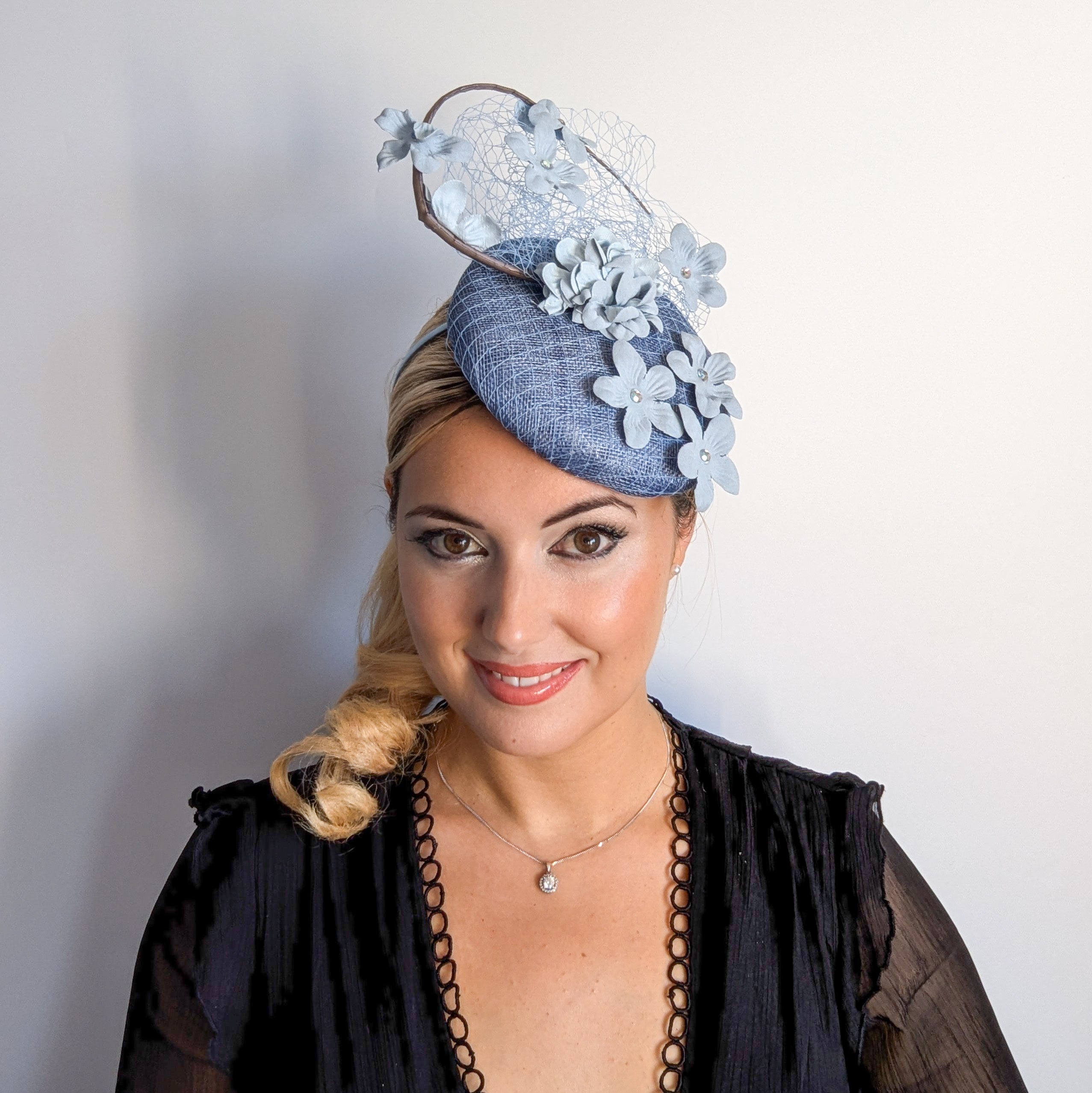 Cappello fascinator fiore verde acquamarina