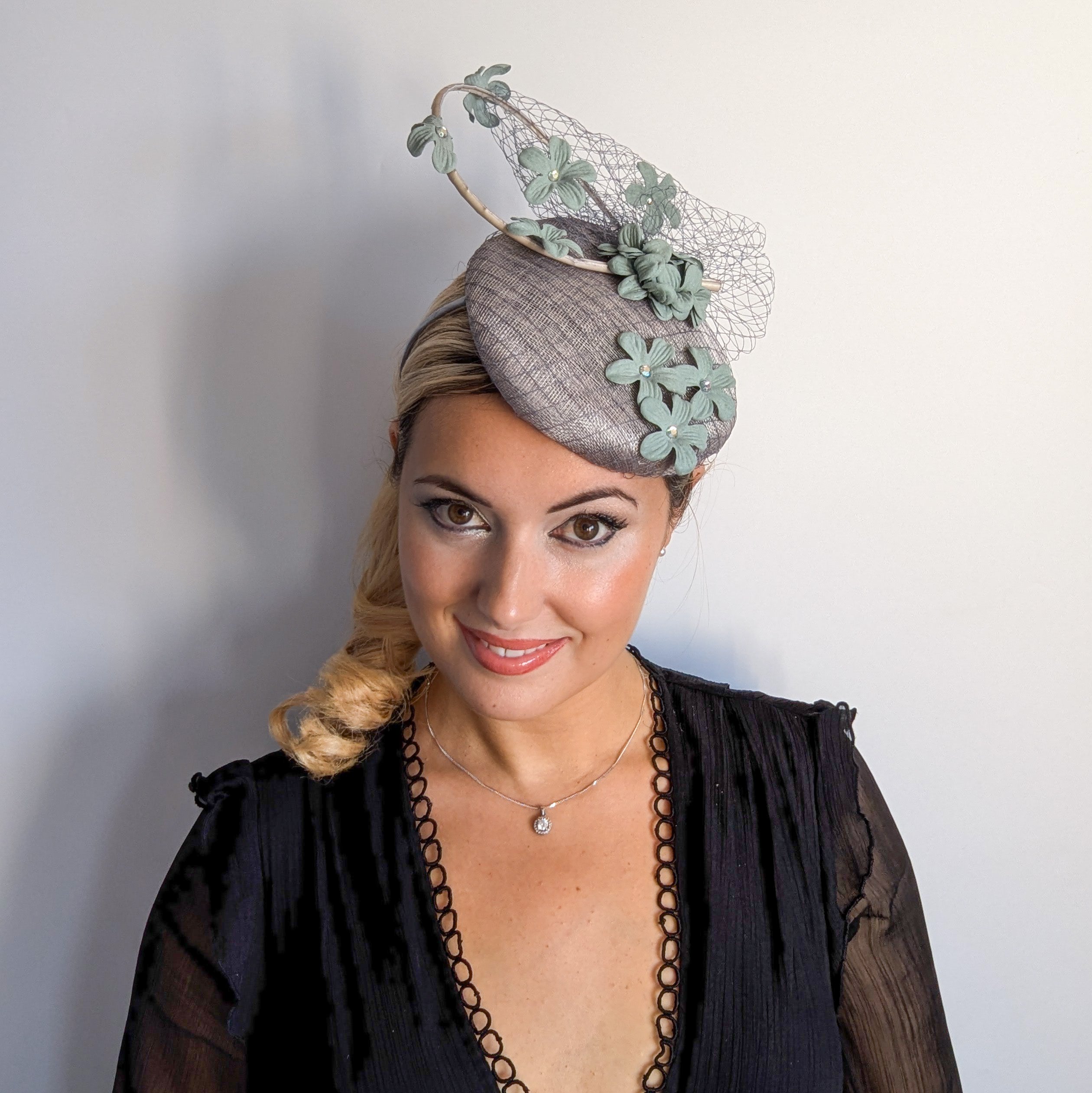 Aquamarine grey blue flower fascinator hat