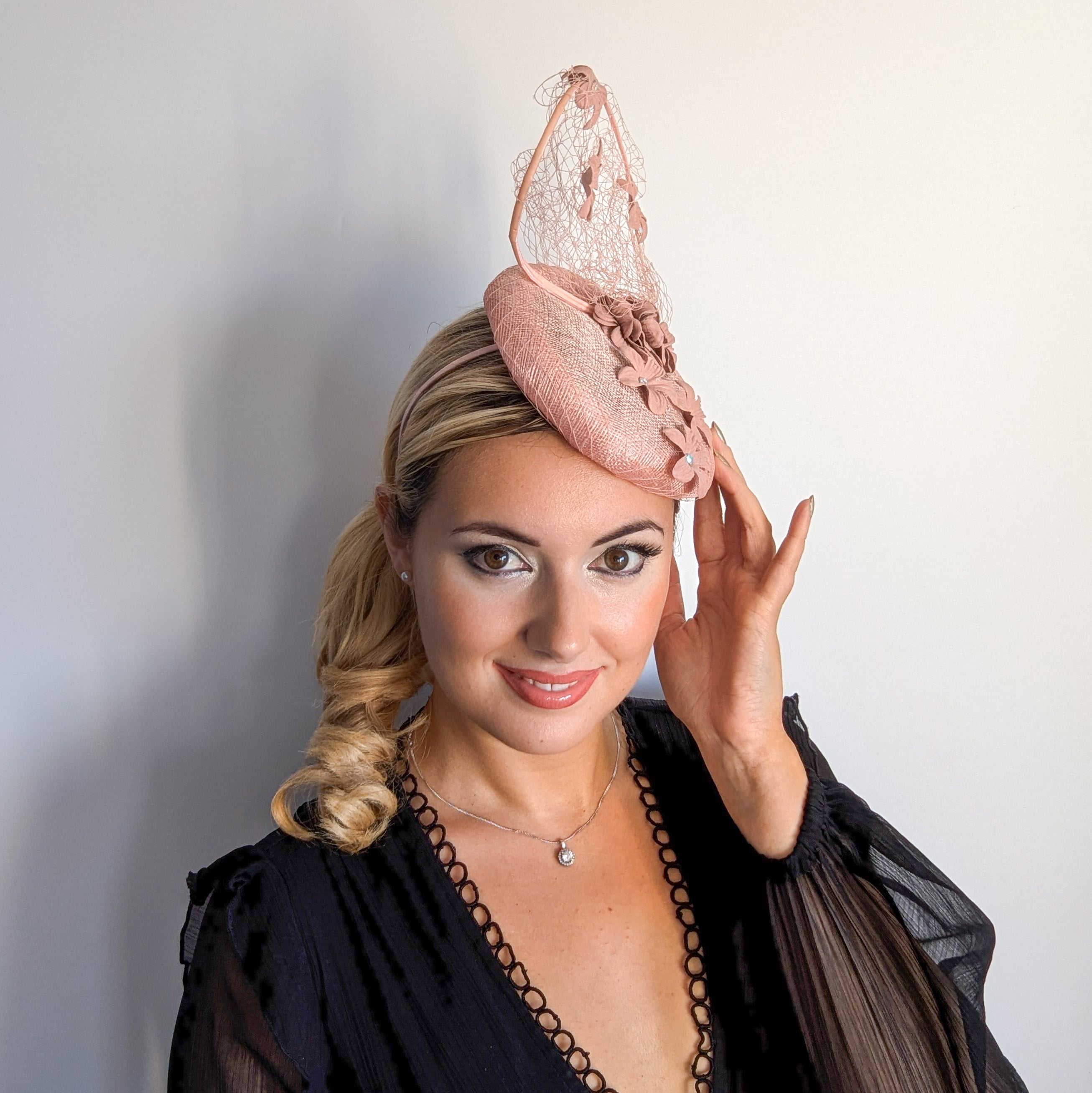 Dusty rose pink flower fascinator hat