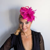 Fuchsia pink feather disc saucer fascinator hat