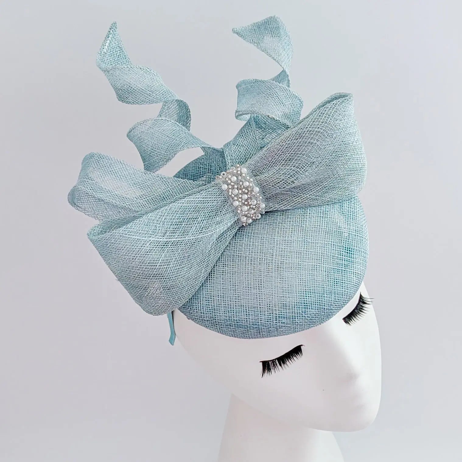 Aquamarine blue crystal bow fascinator hat - House of Hats