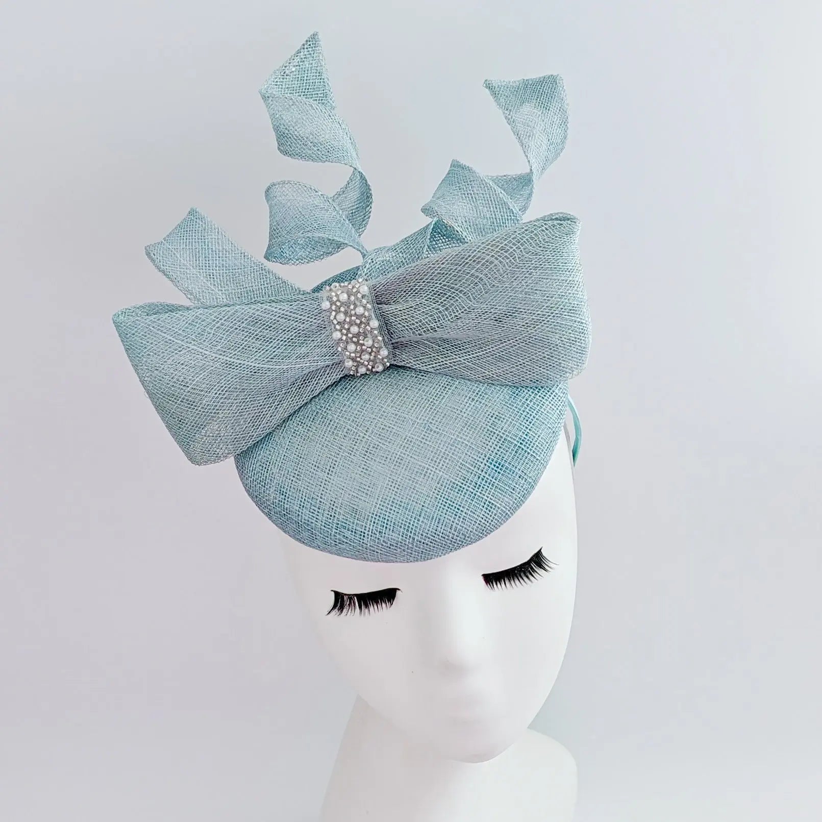 Aquamarine blue crystal bow fascinator hat - House of Hats