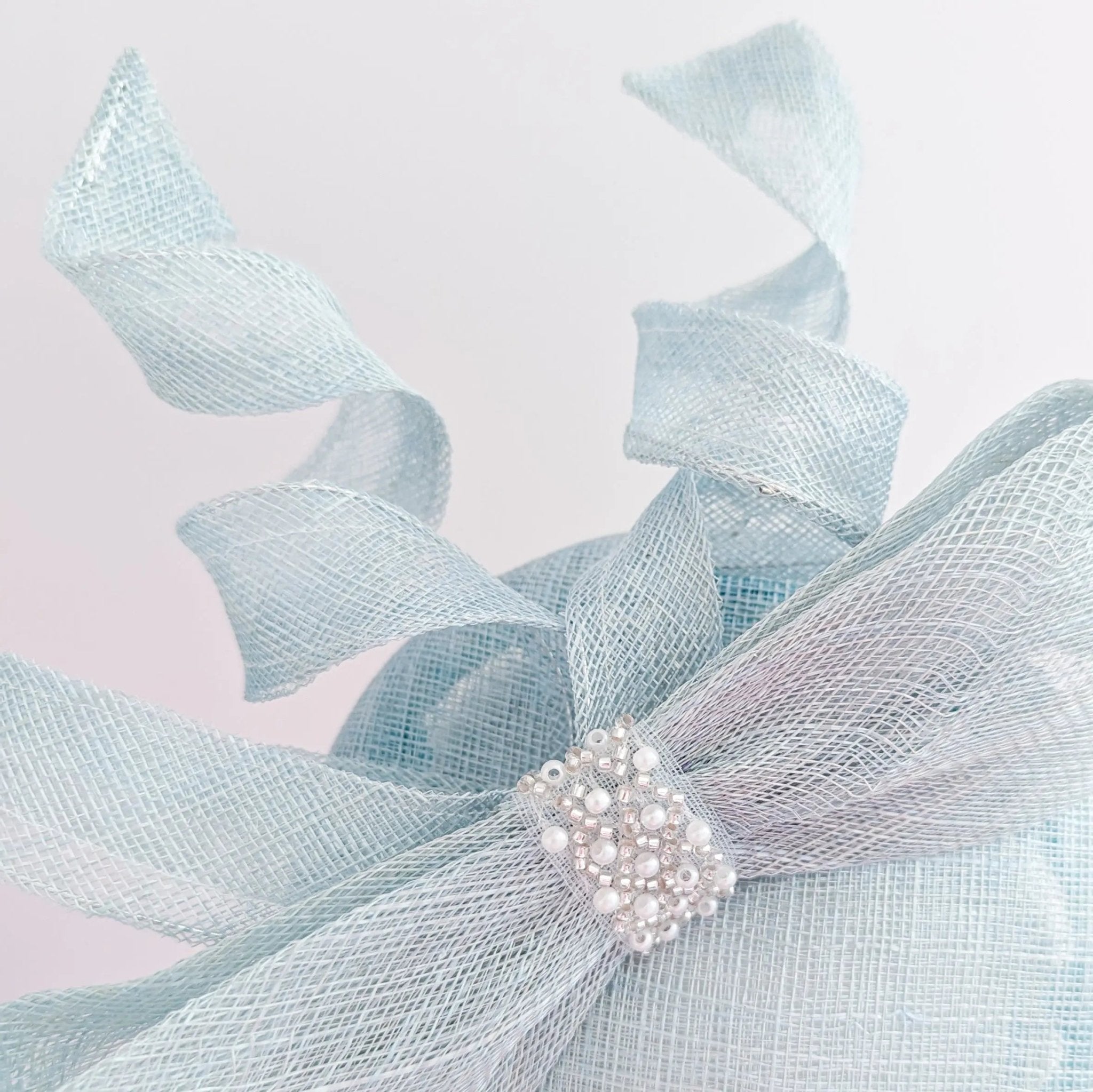 Aquamarine blue crystal bow fascinator hat - House of Hats