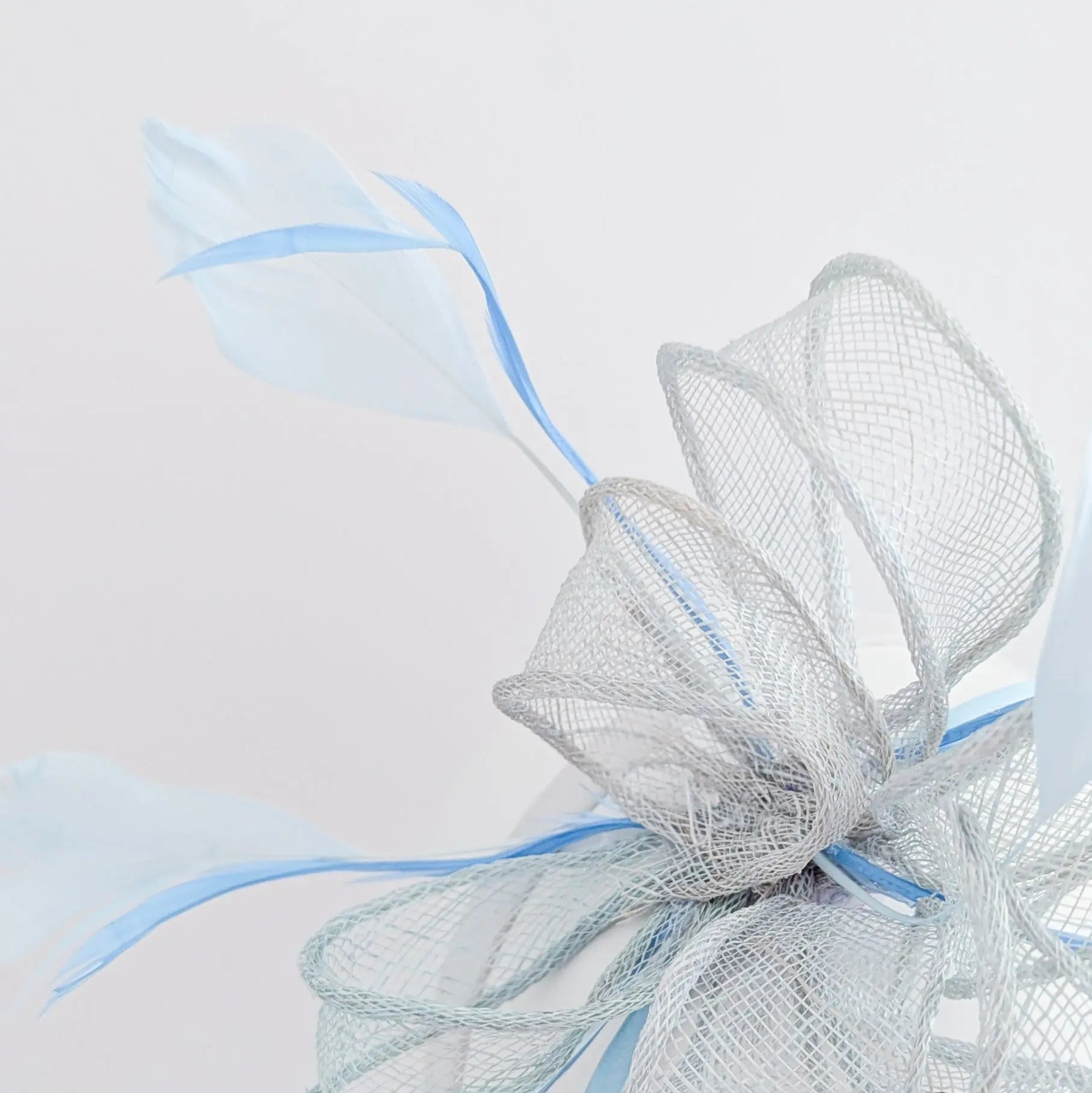 Aquamarine blue feather fascinator hat - House of Hats