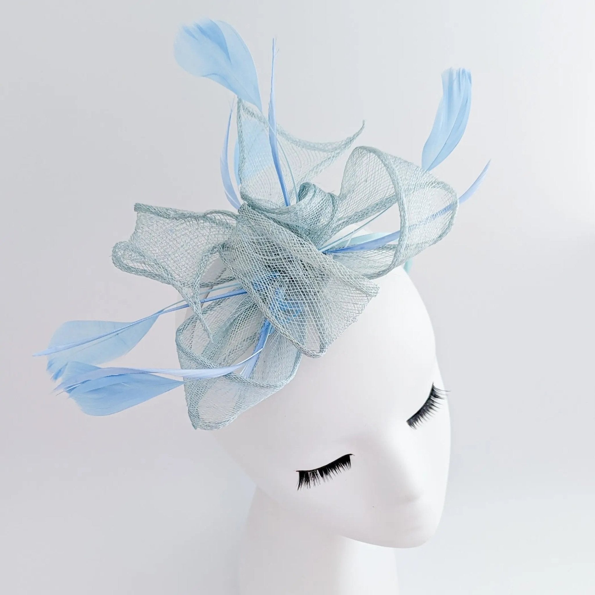 Aquamarine blue feather fascinator hat - House of Hats