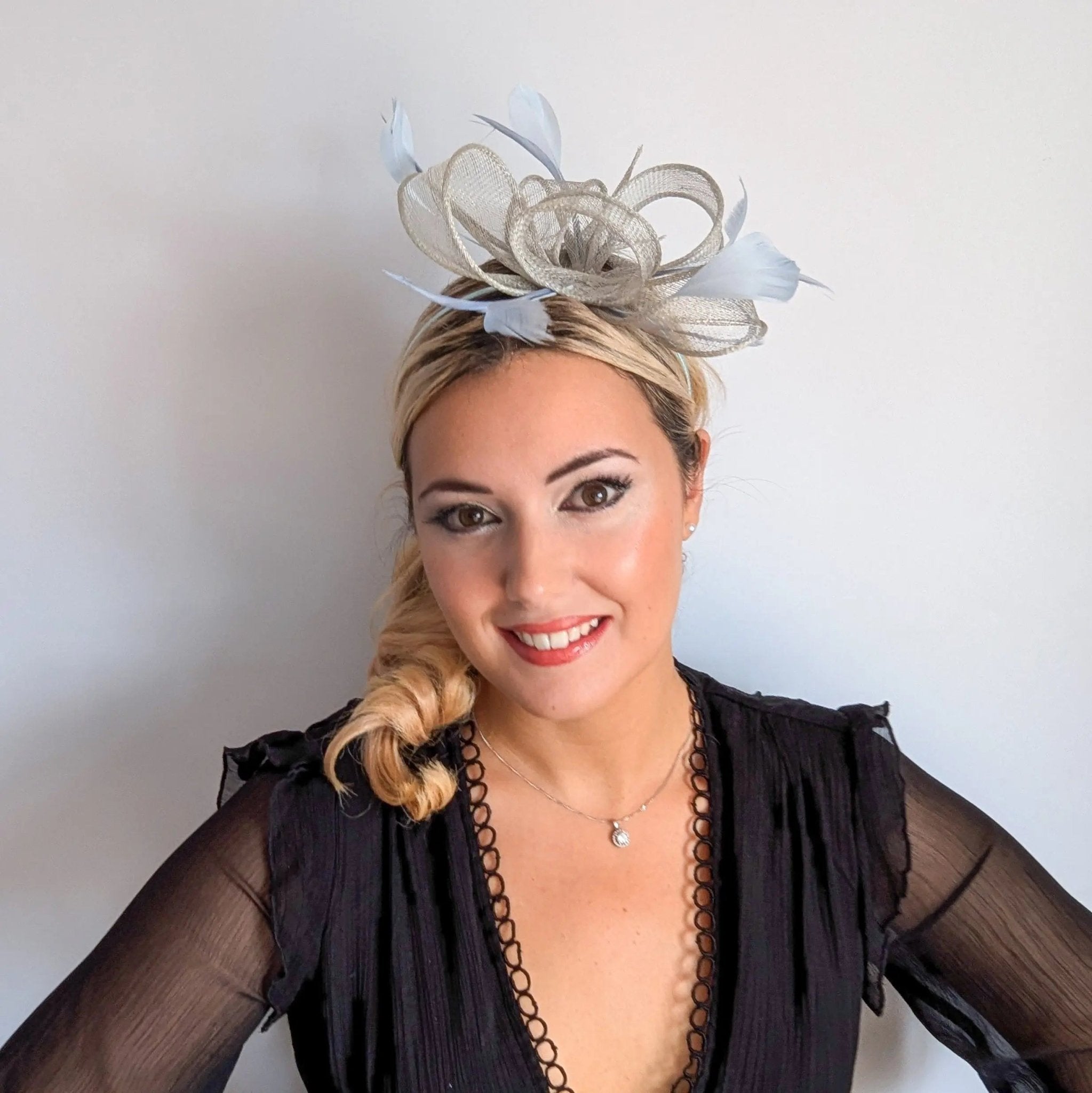 Aquamarine blue feather fascinator hat - House of Hats