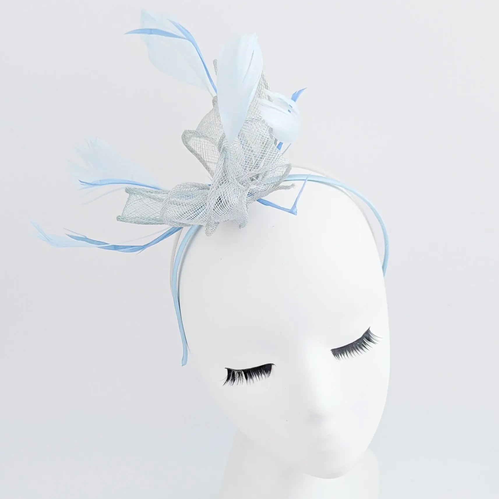 Aquamarine blue feather fascinator hat - House of Hats