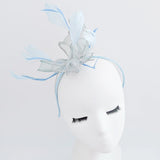 Aquamarine blue feather fascinator hat - House of Hats