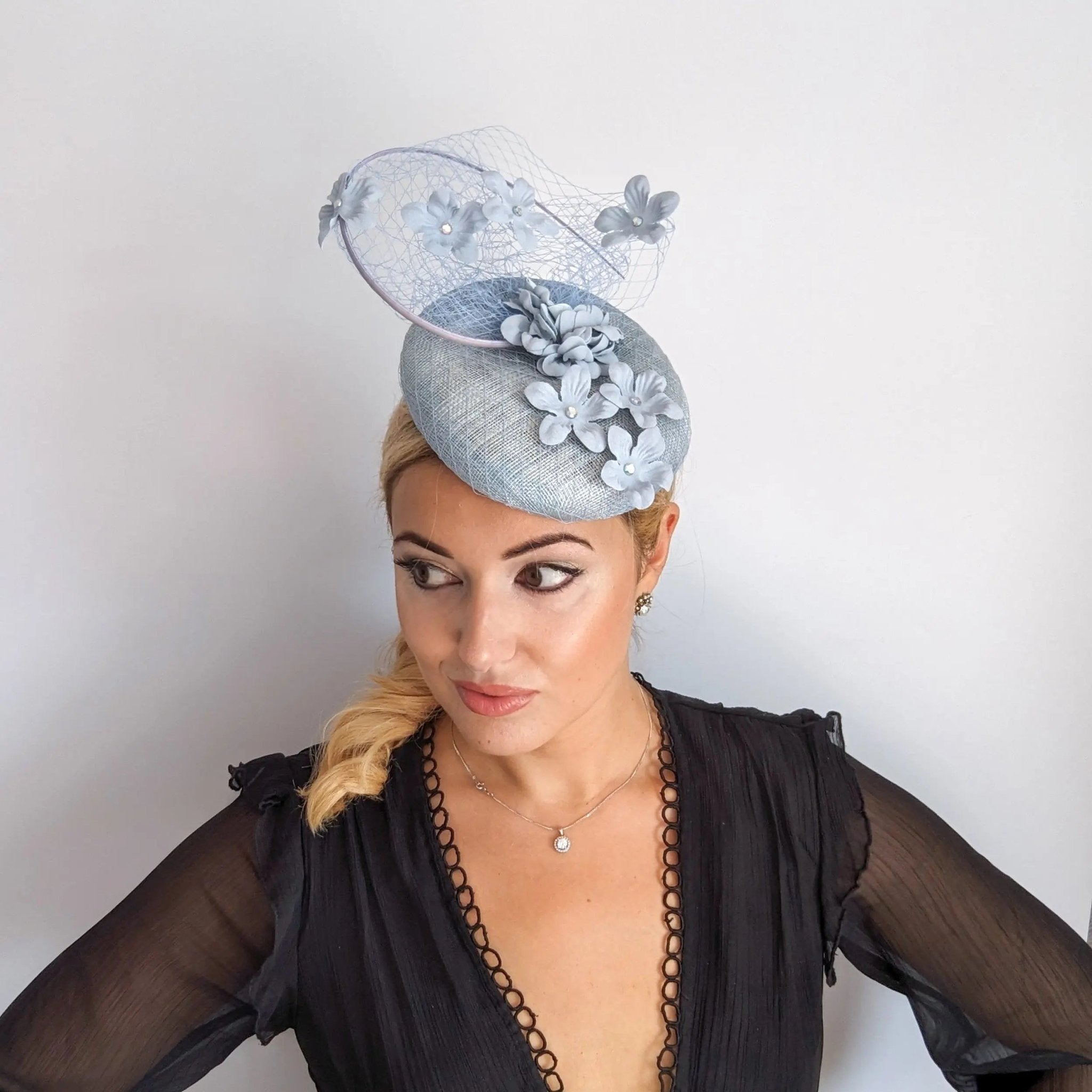 Aquamarine blue flower fascinator hat - House of Hats