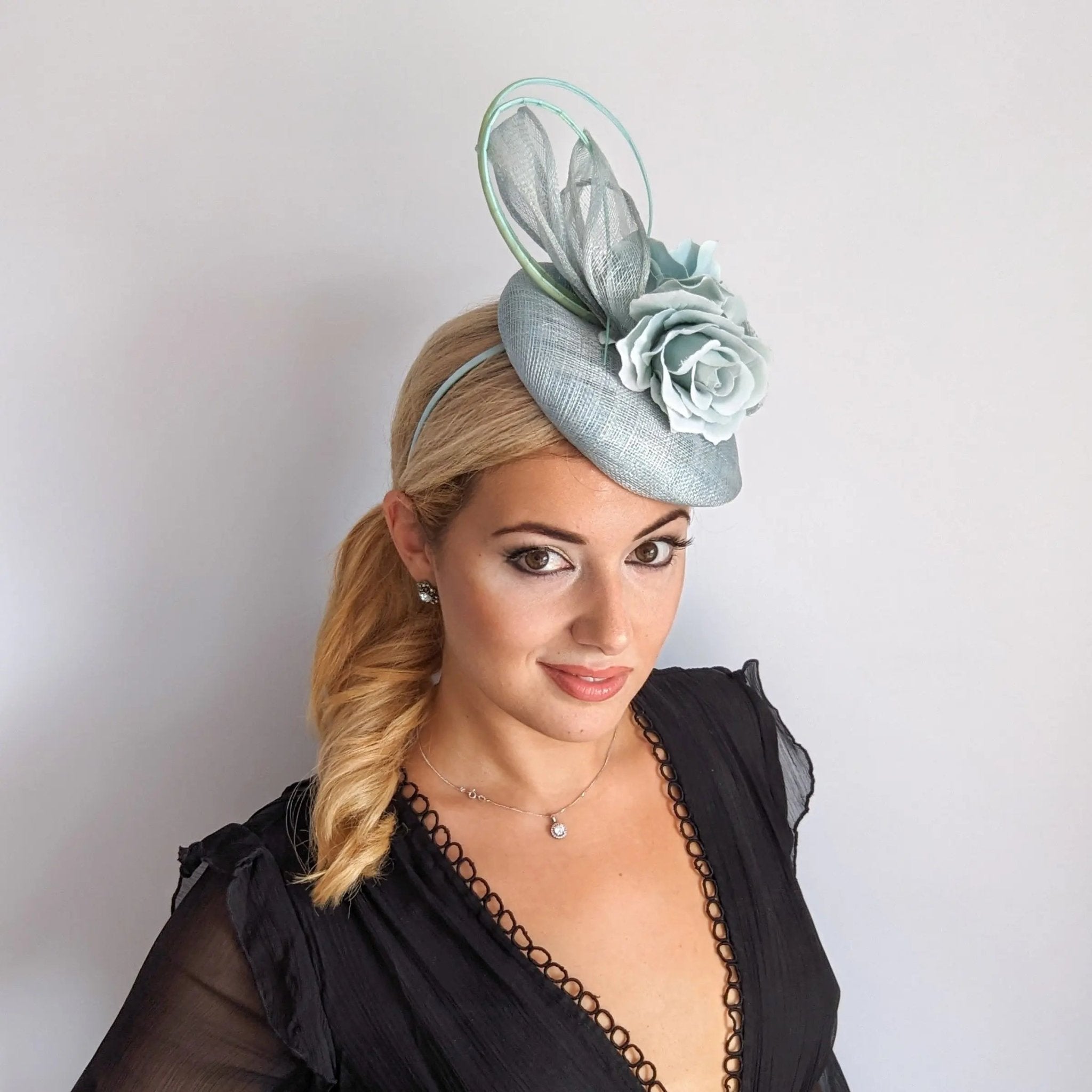 Aquamarine blue flower fascinator hat - House of Hats