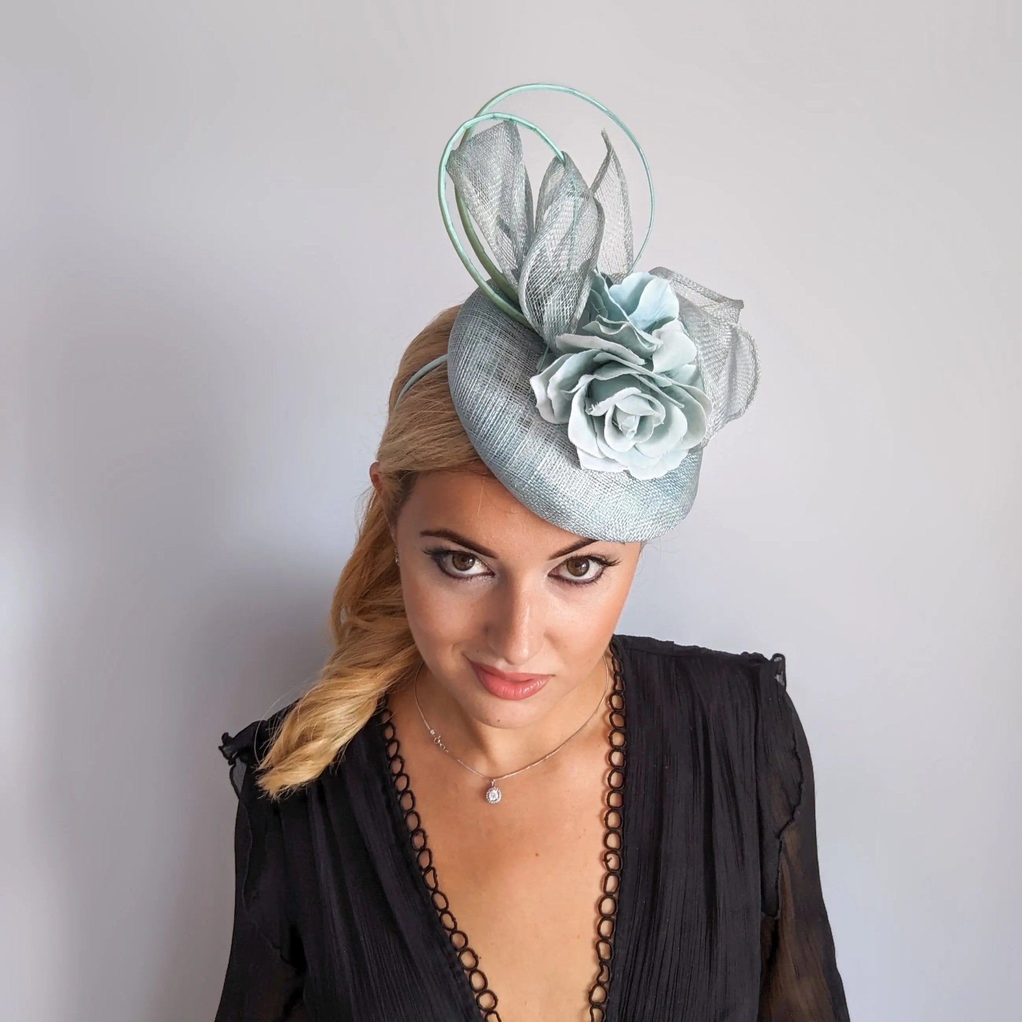 Aquamarine blue flower fascinator hat - House of Hats