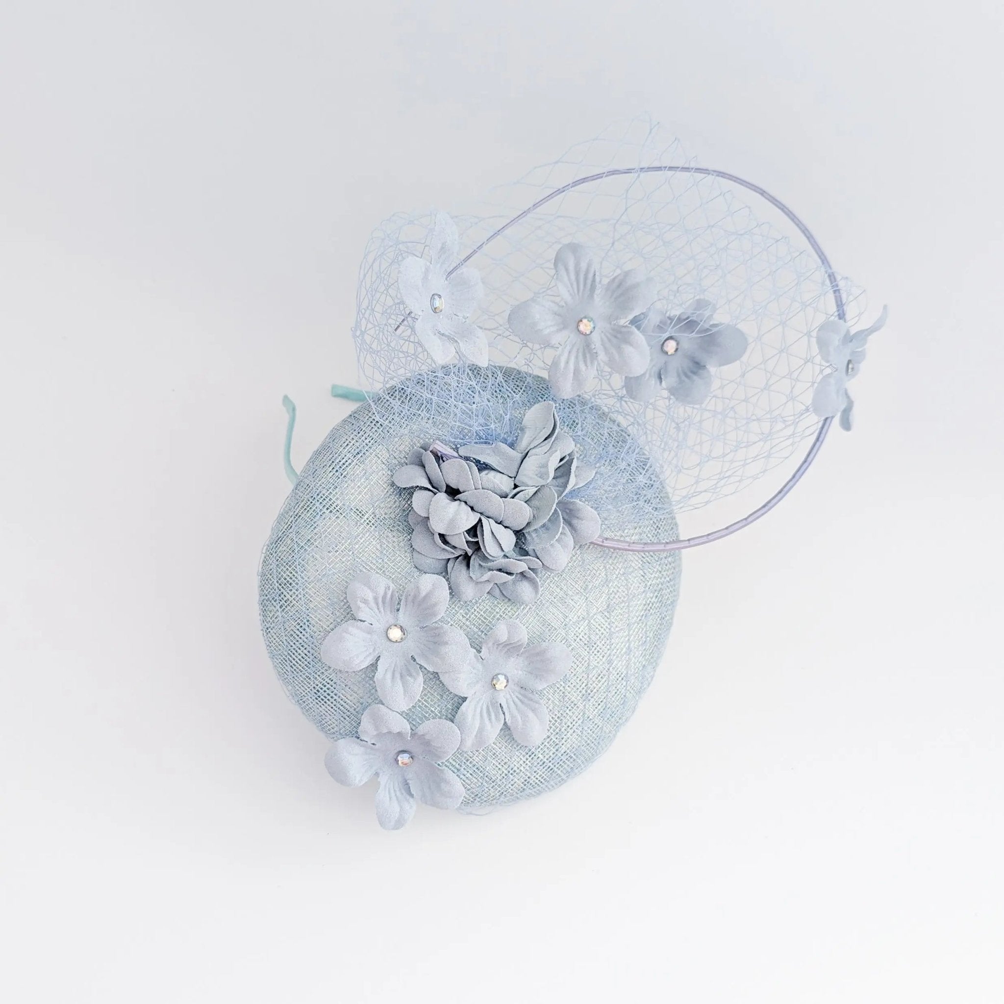 Aquamarine blue flower fascinator hat - House of Hats