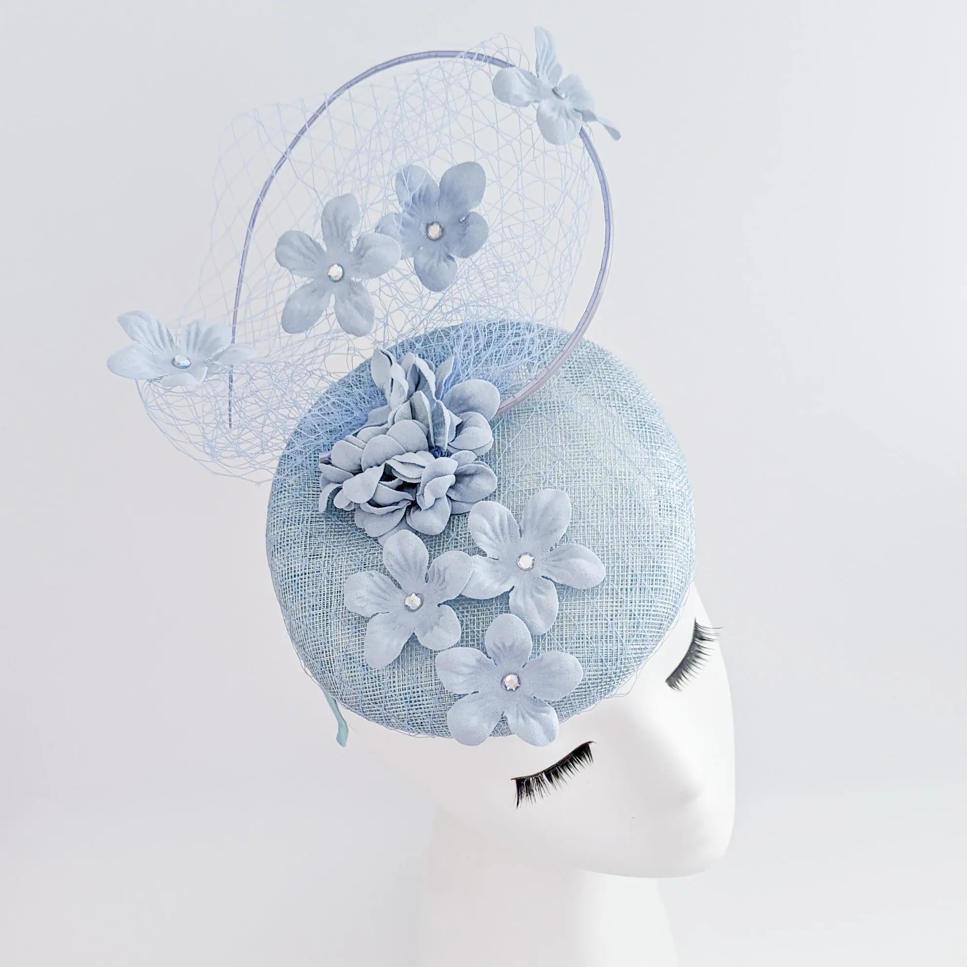 Aquamarine blue flower fascinator hat - House of Hats
