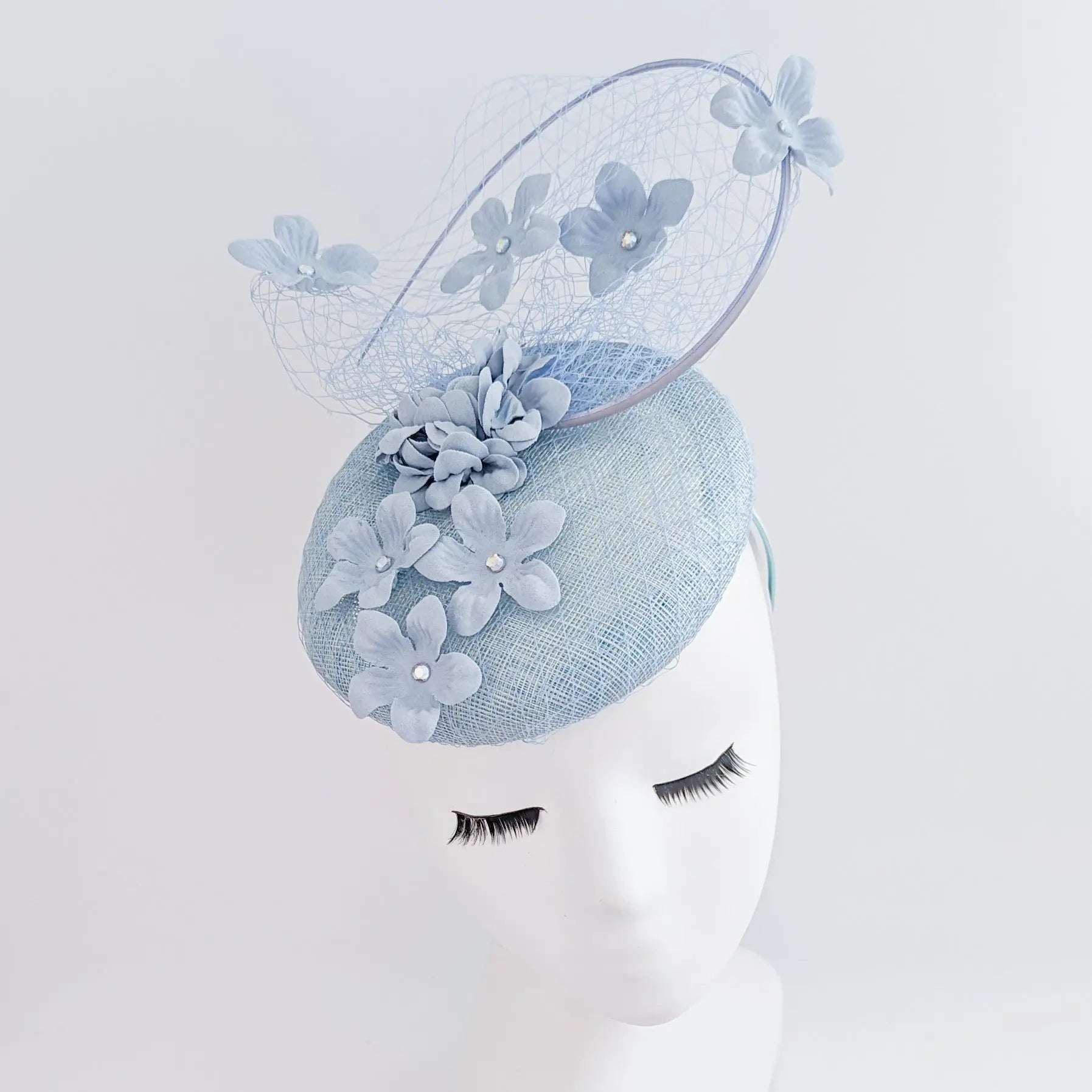 Aquamarine blue flower fascinator hat - House of Hats