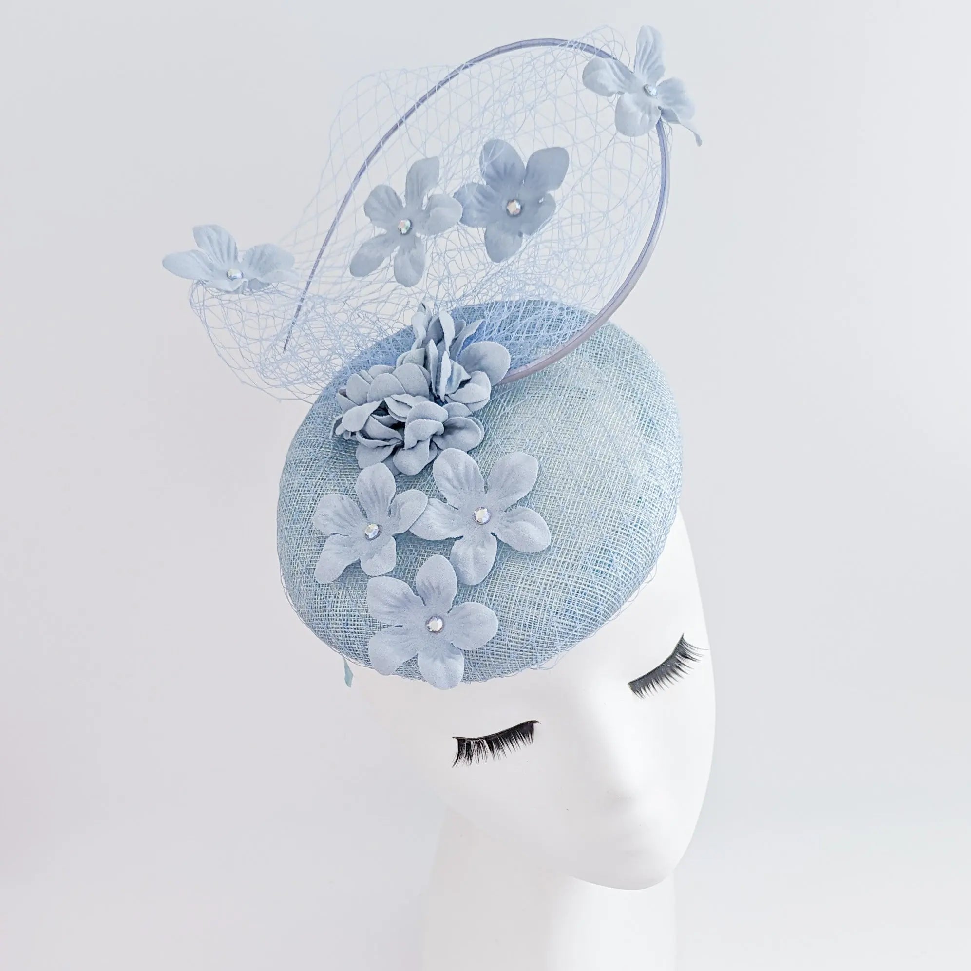 Aquamarine blue flower fascinator hat - House of Hats