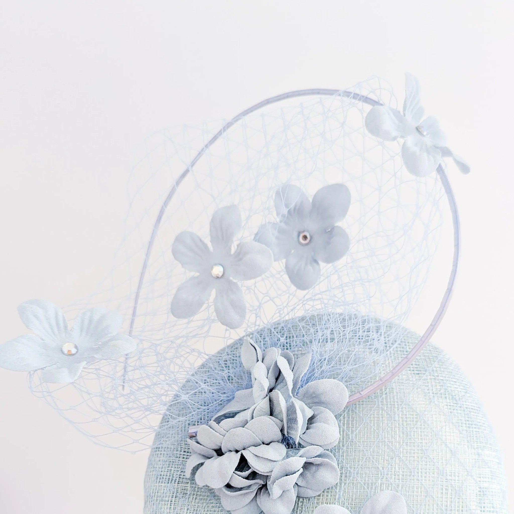 Aquamarine blue flower fascinator hat - House of Hats