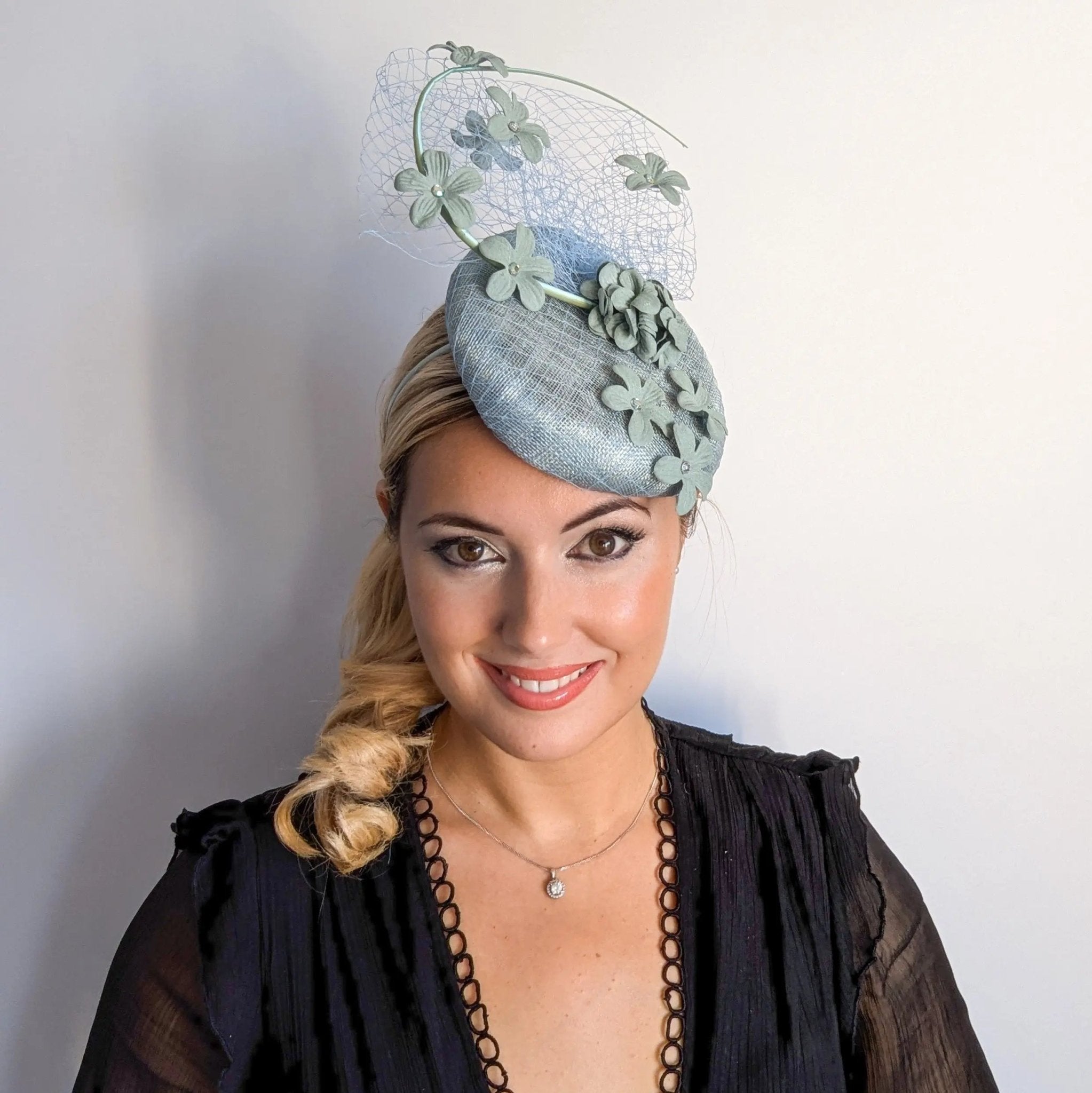 Aquamarine blue flower fascinator hat - House of Hats