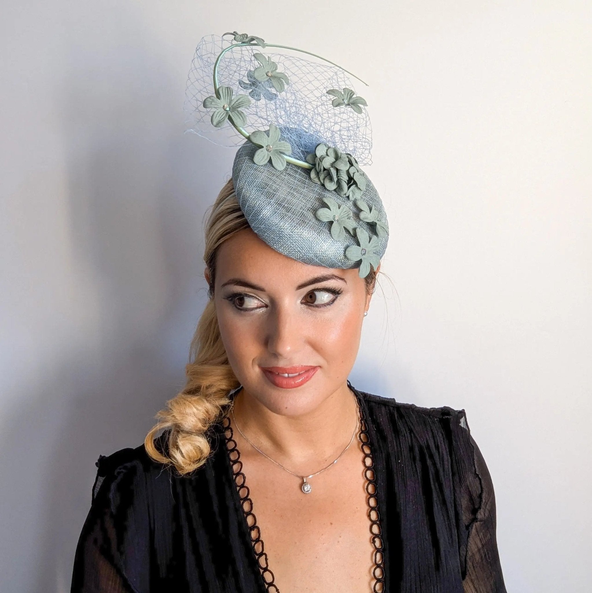 Aquamarine blue flower fascinator hat - House of Hats