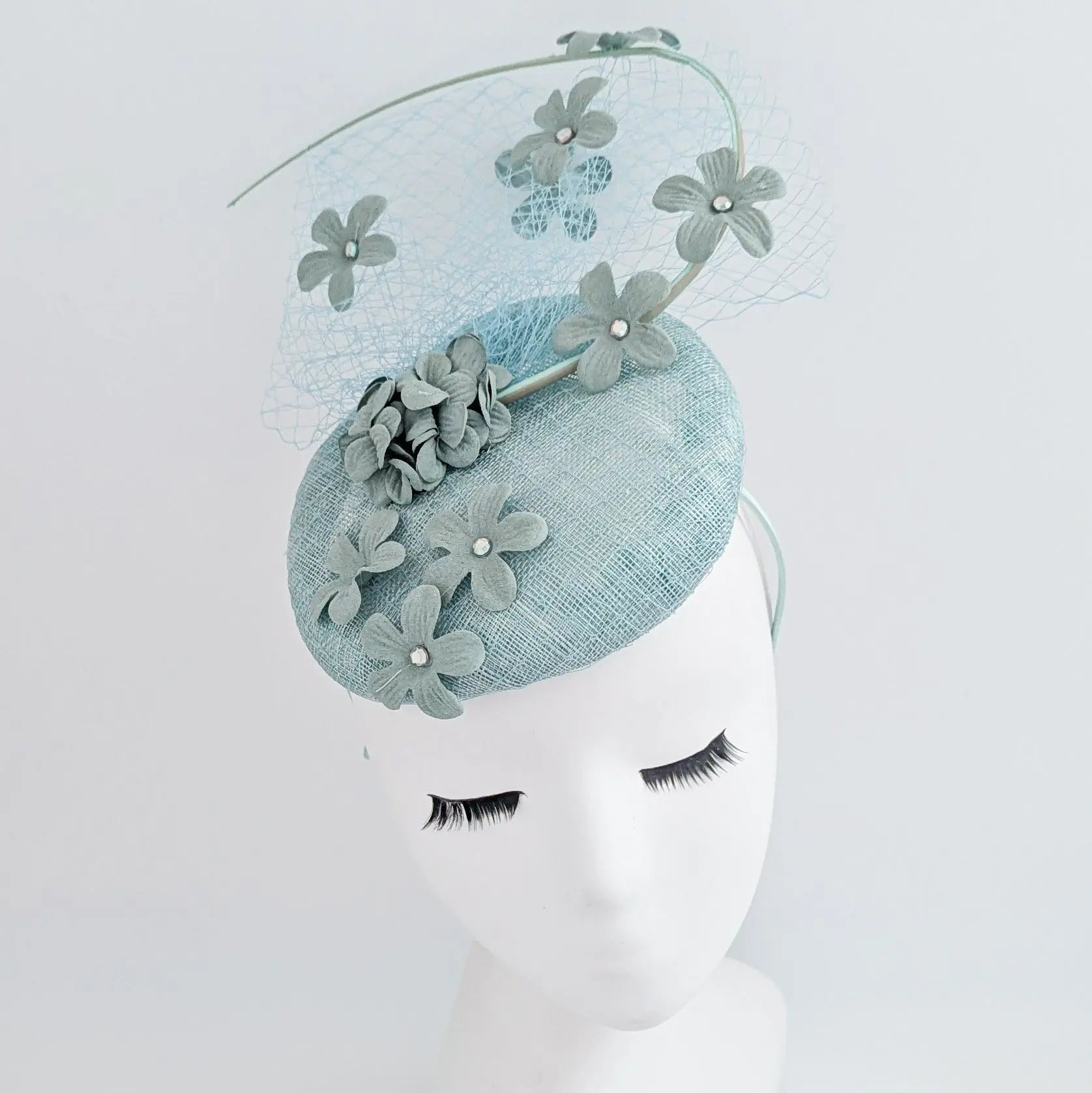 Aquamarine blue flower fascinator hat - House of Hats