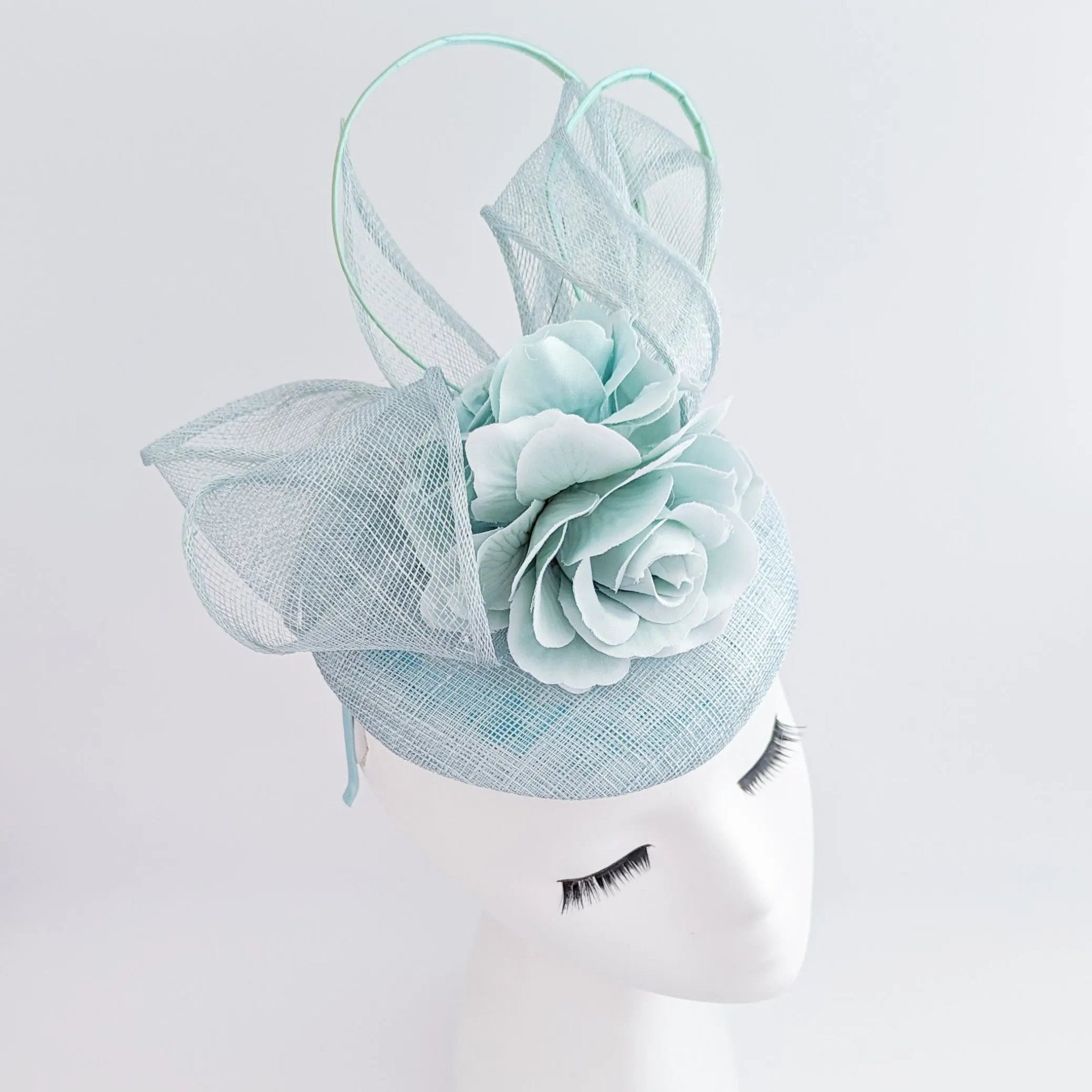 Aquamarine blue flower fascinator hat - House of Hats