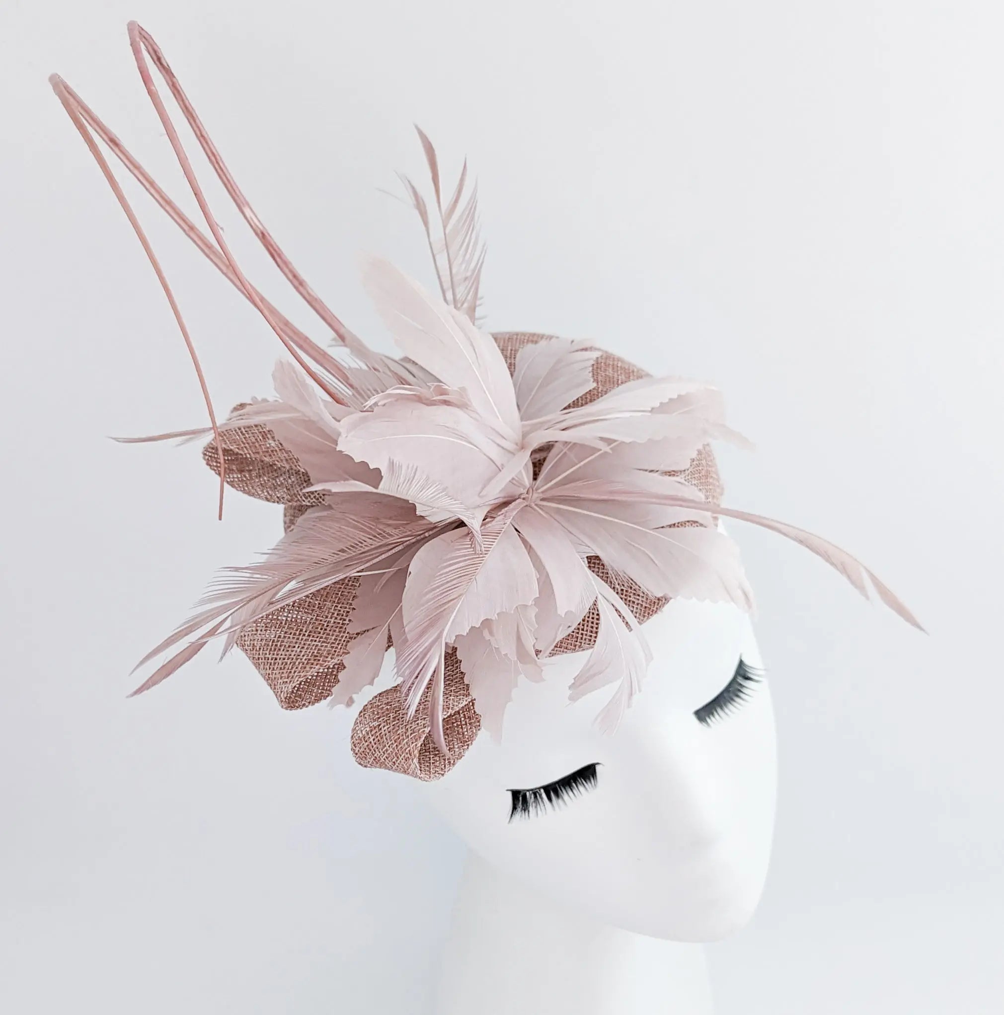Blush pink feather fascinator hat - House of Hats