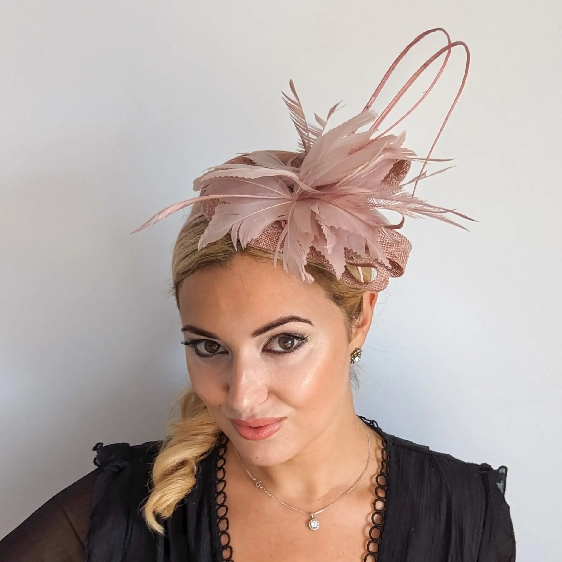 Blush pink feather fascinator hat - House of Hats