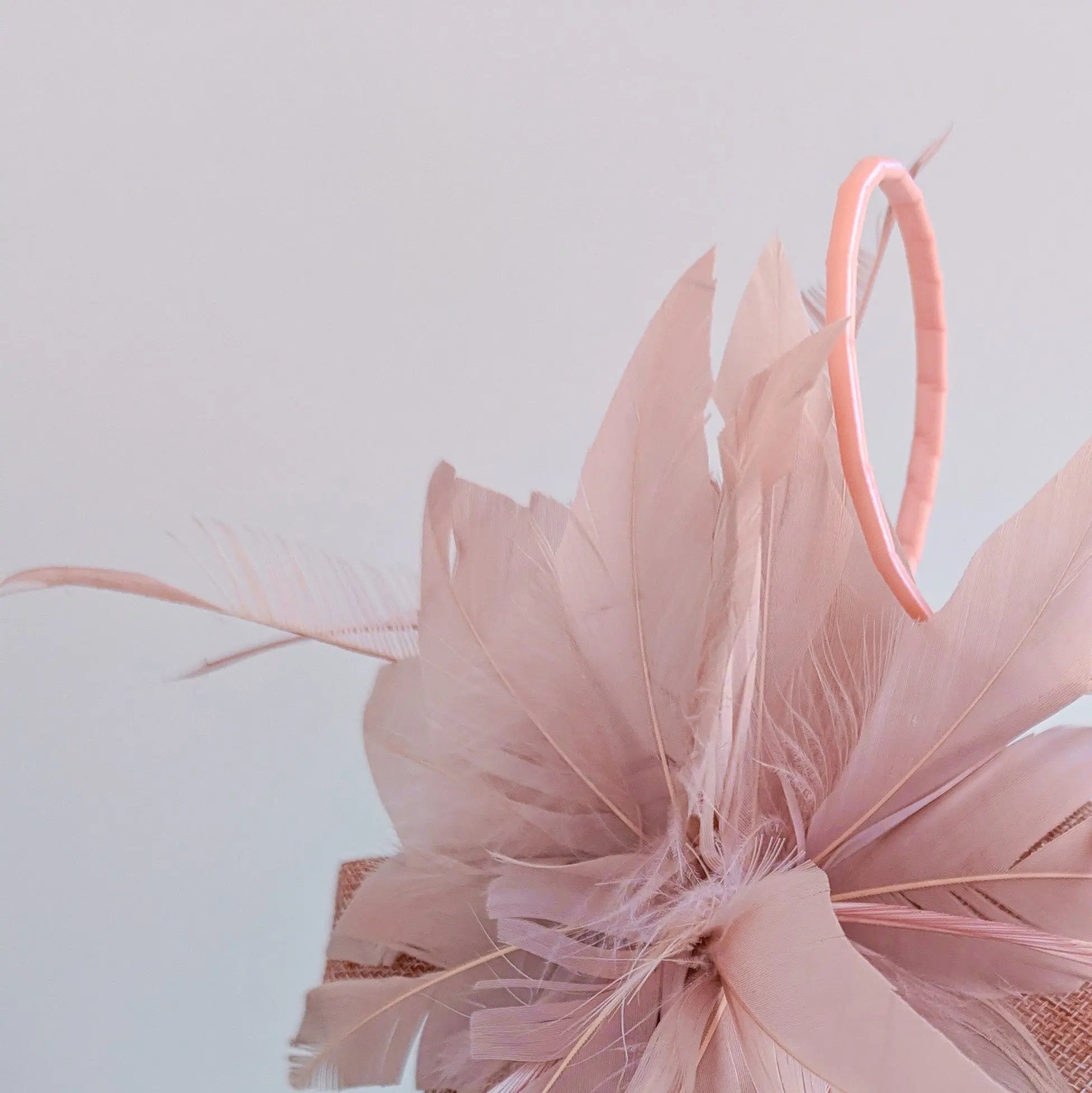 Blush pink feather fascinator hat - House of Hats