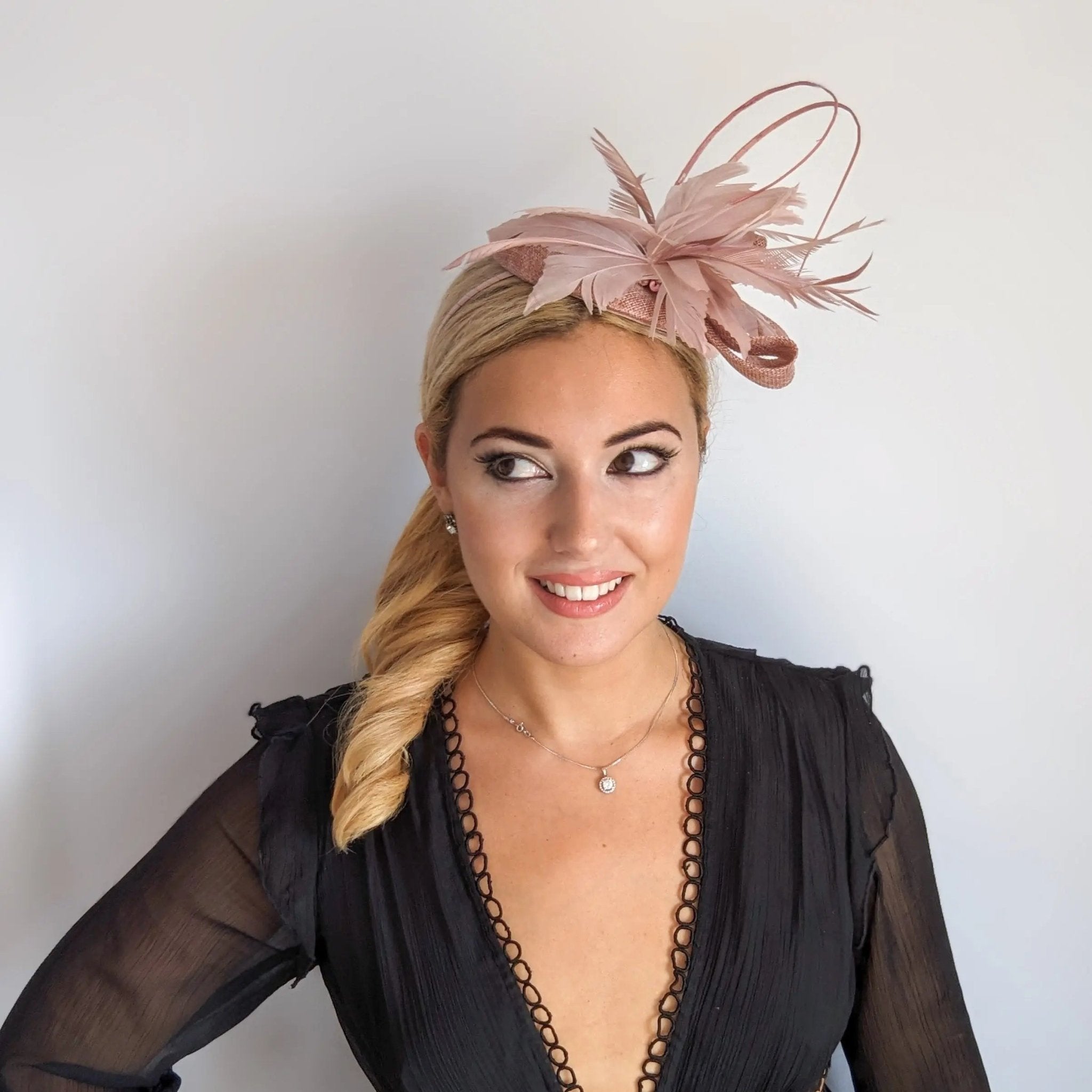 Blush pink feather fascinator hat - House of Hats