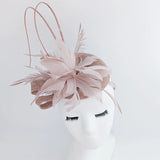 Blush pink feather fascinator hat - House of Hats