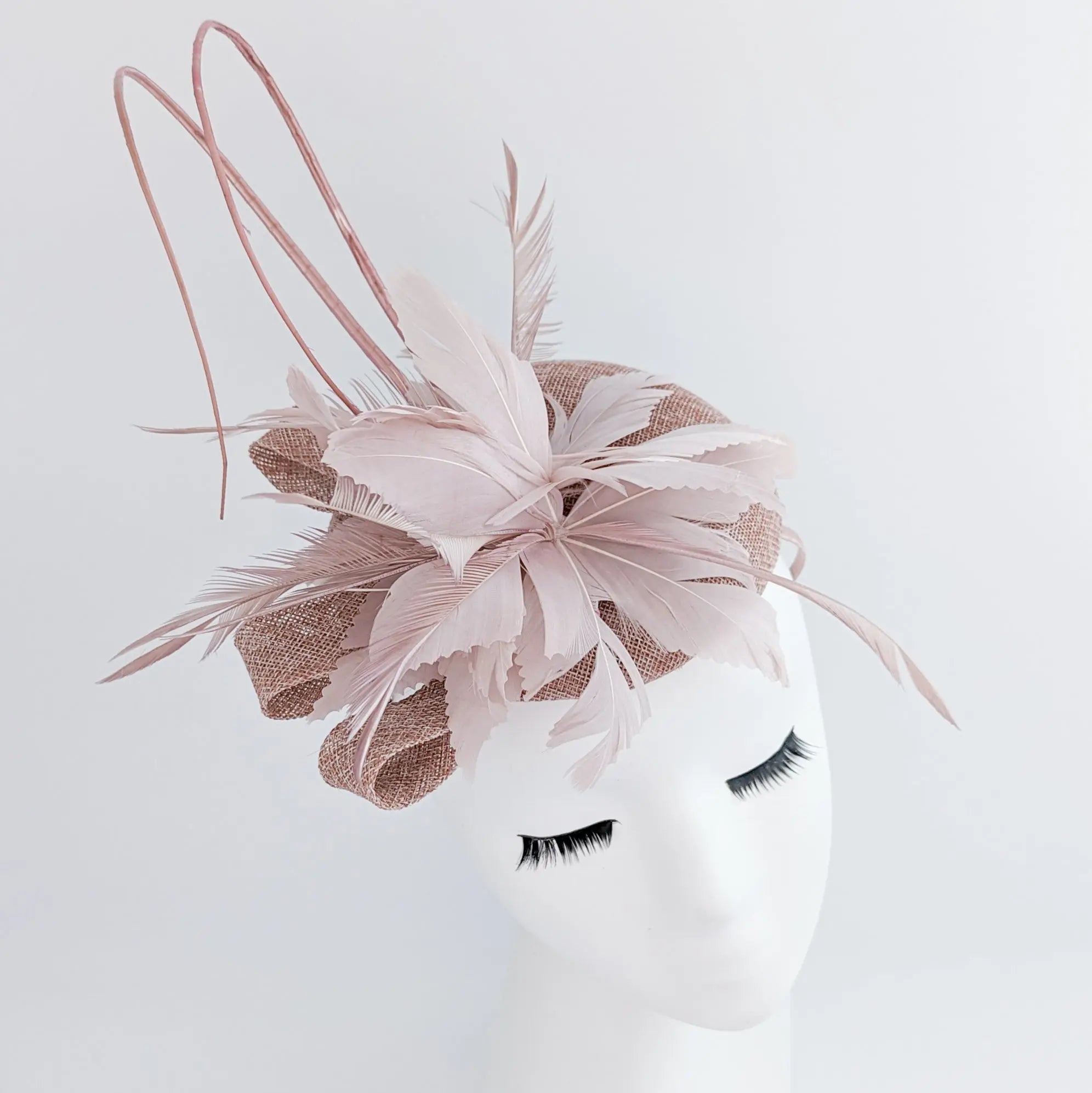 Blush pink feather fascinator hat - House of Hats