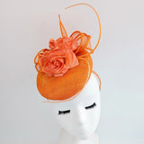 Bright orange coral flower fascinator hat - House of Hats