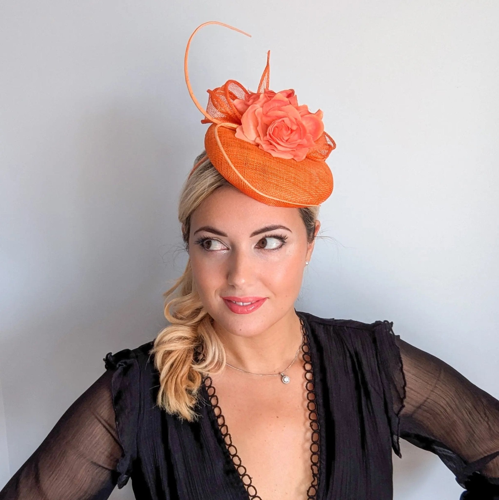Bright orange coral flower fascinator hat - House of Hats