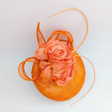 Bright orange coral flower fascinator hat - House of Hats
