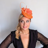 Bright orange coral flower fascinator hat - House of Hats